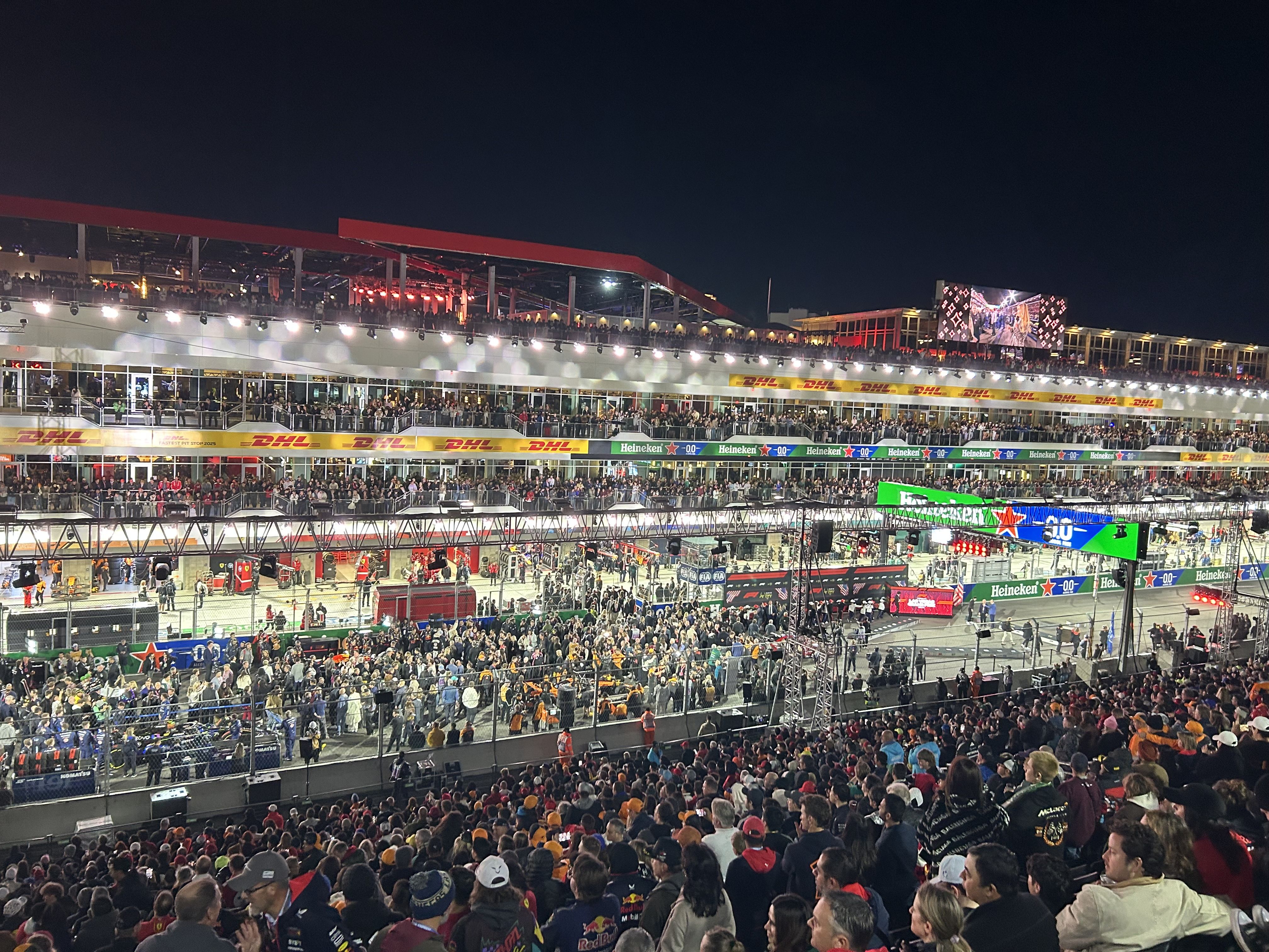 Photo: Mike Allen/Axios Mike took this photo, with a peek into the pits from the start/finish line in the grandstands last night. Red Bull Racing CEO Laurent Mekies said after the third annual Las Vegas Grand Prix: "Every race in Vegas has been better than the previous one ... It feels like Formula 