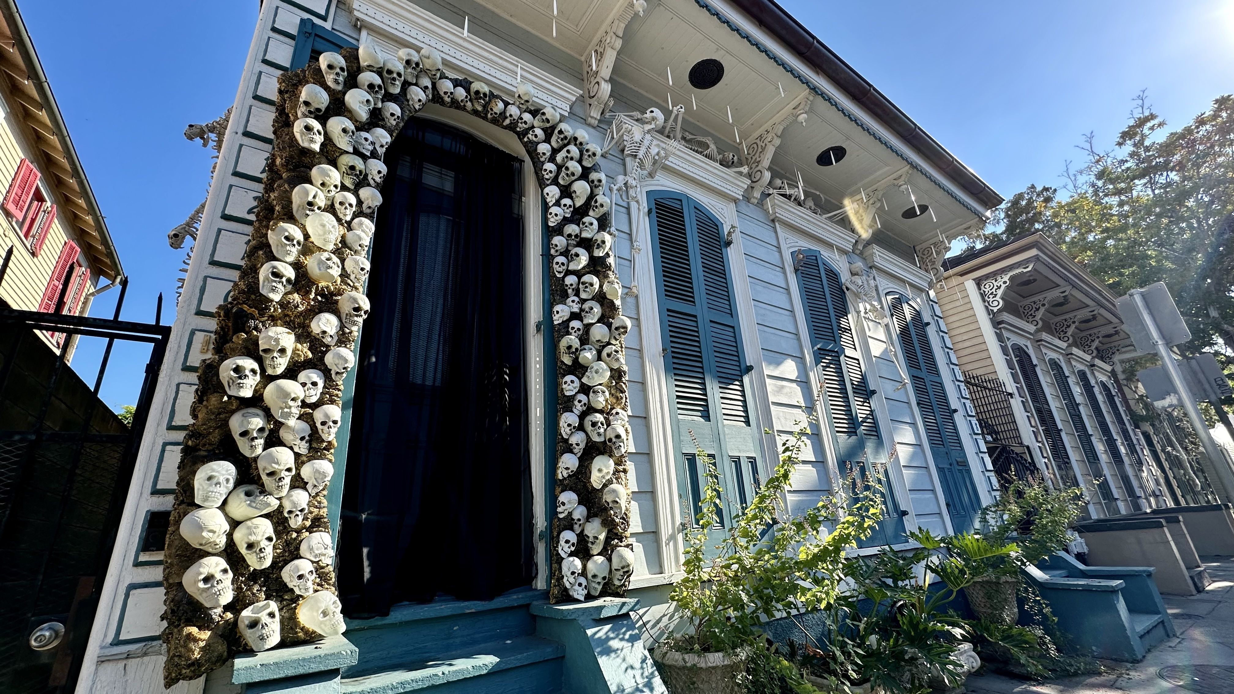 Photo shows skulls decorating the doorway.
