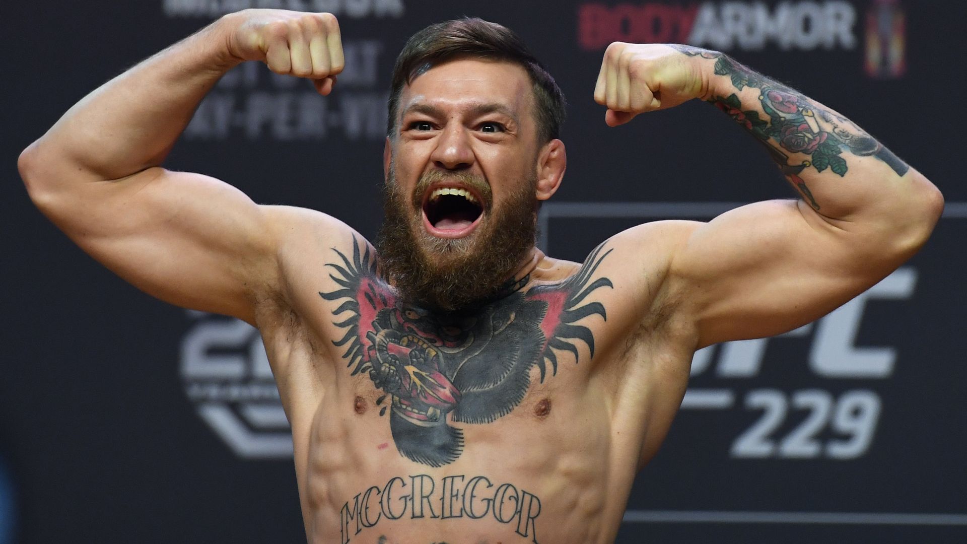 Conor McGregor flexing