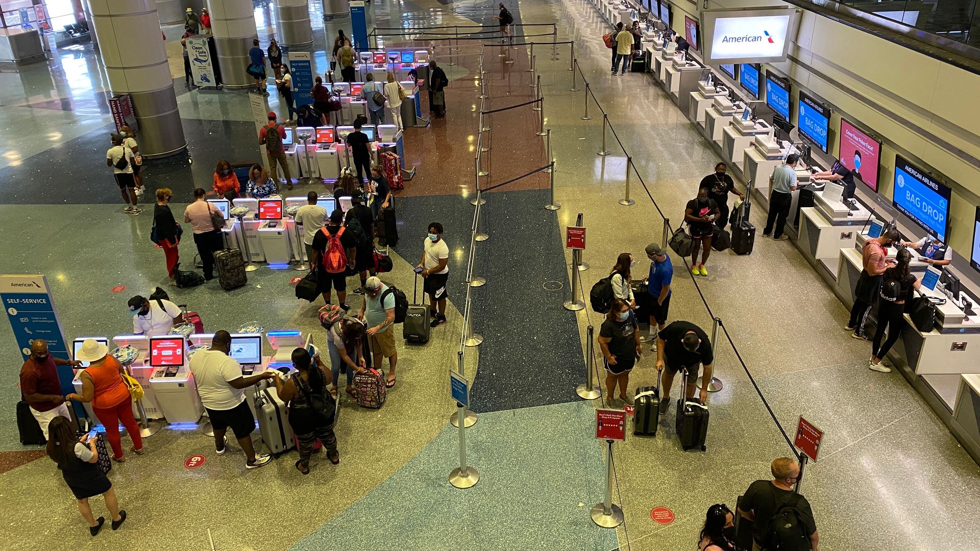 Passengers in the Las Vegas International Airport on Aug. 29.