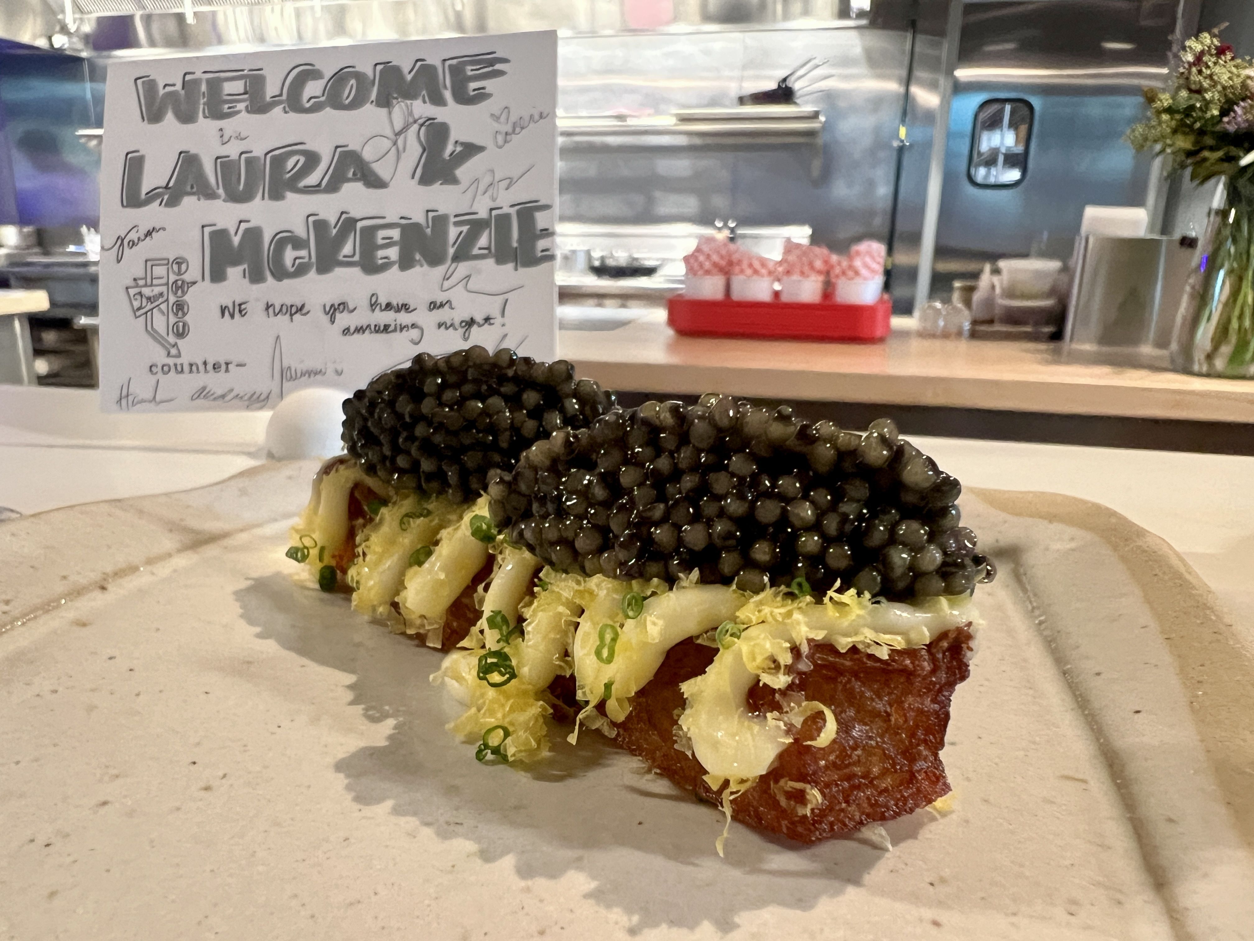 a large fry with caviar on top