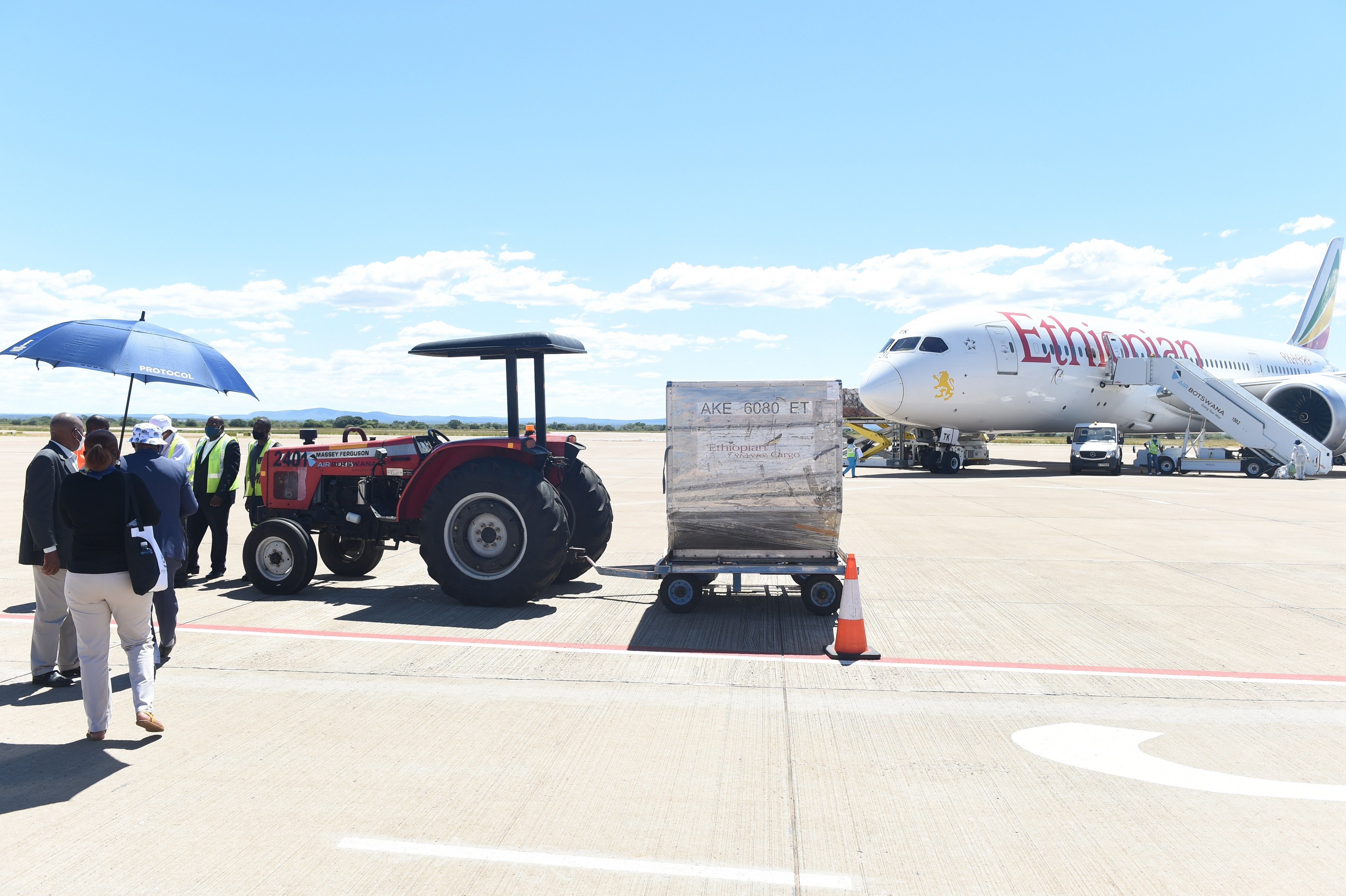 COVID-19 vaccines are unloaded from an Ethiopian aircraft at Sir Seretse Khama International Airport in Gaborone, Botswana, on March 27