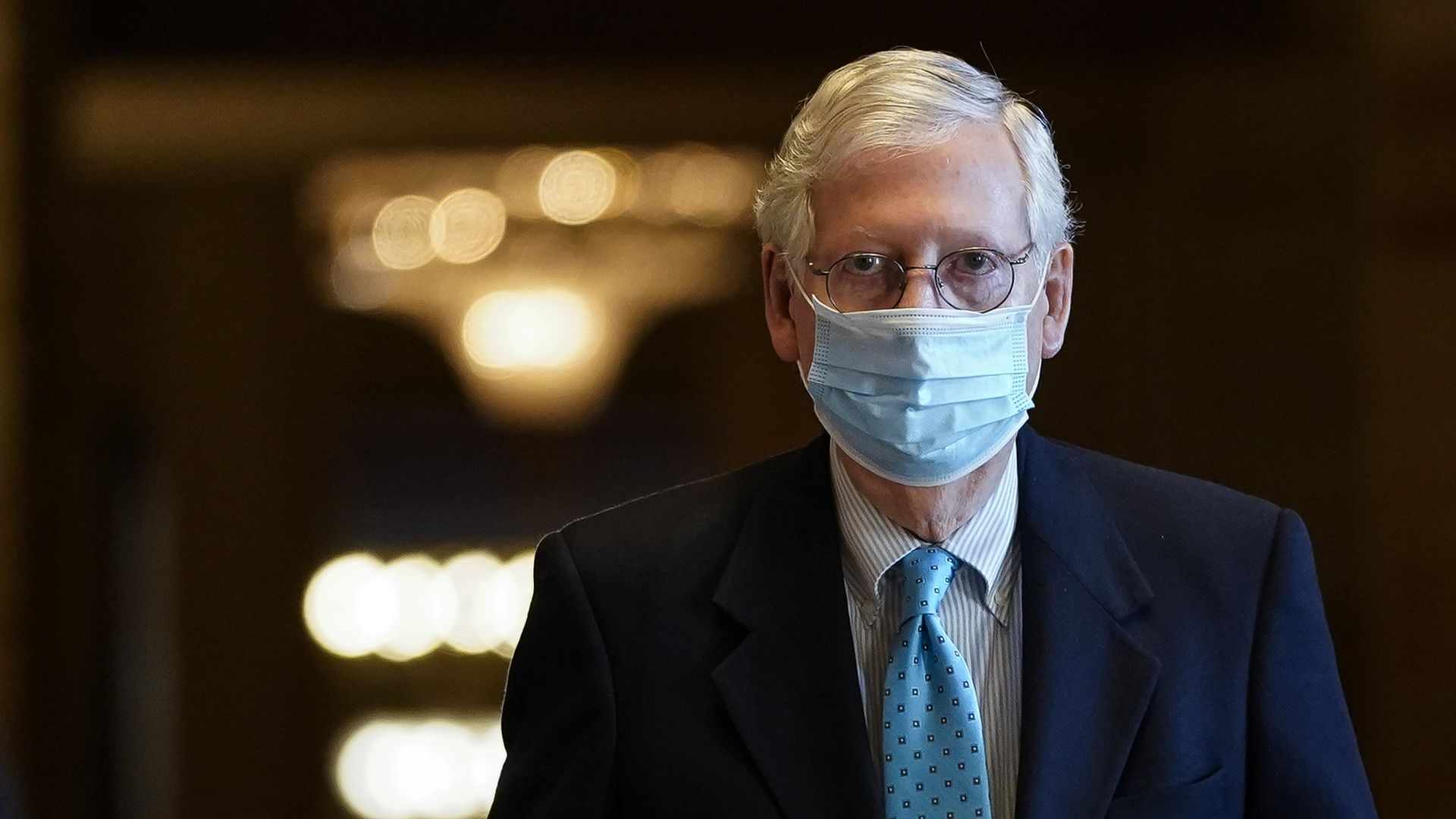Senate Minority Leader Mitch McConnell (R-KY) leaves his office and walks to the Senate floor at the U.S. Capitol on February 8