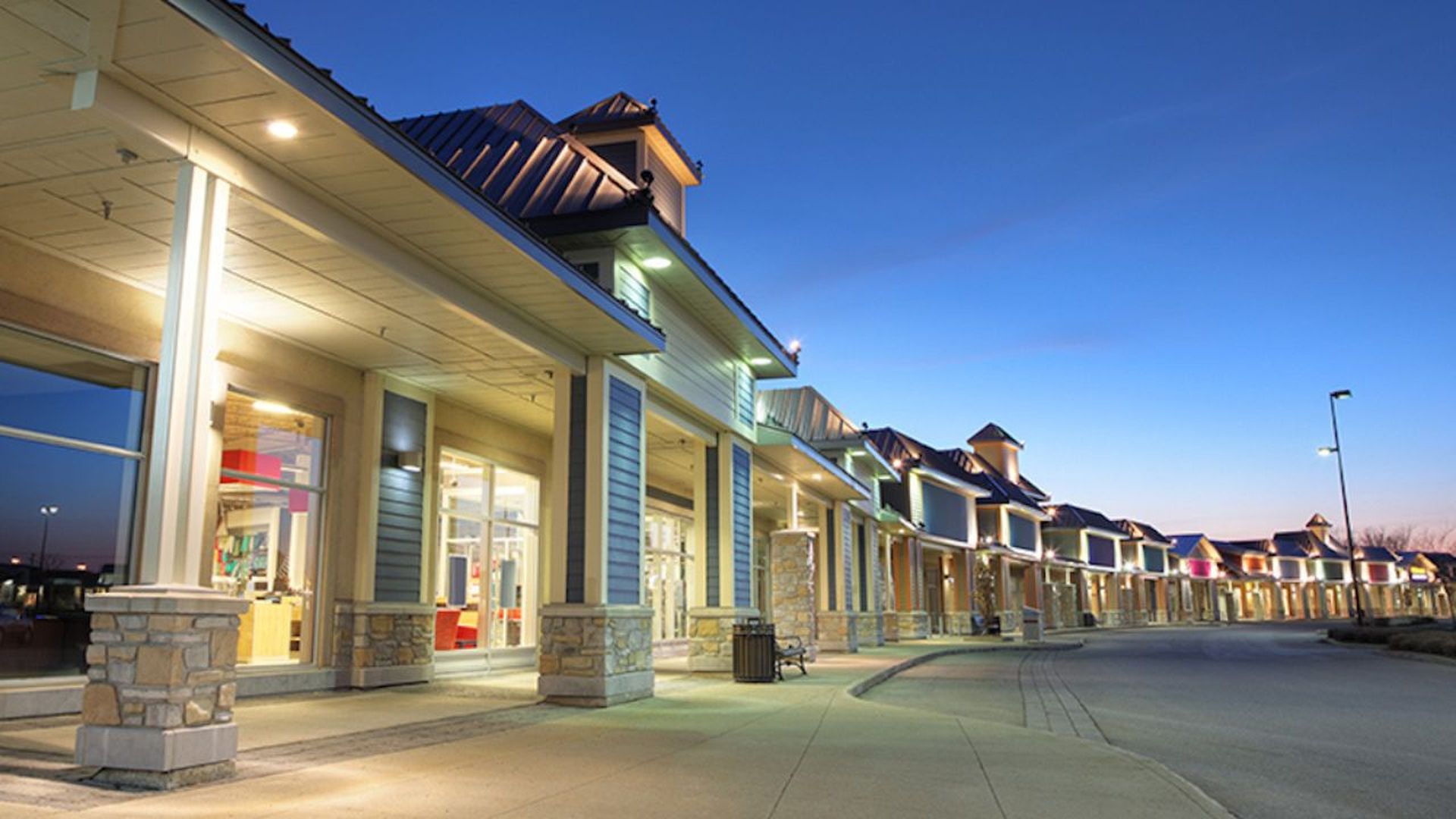 The outside of a long building with pillars