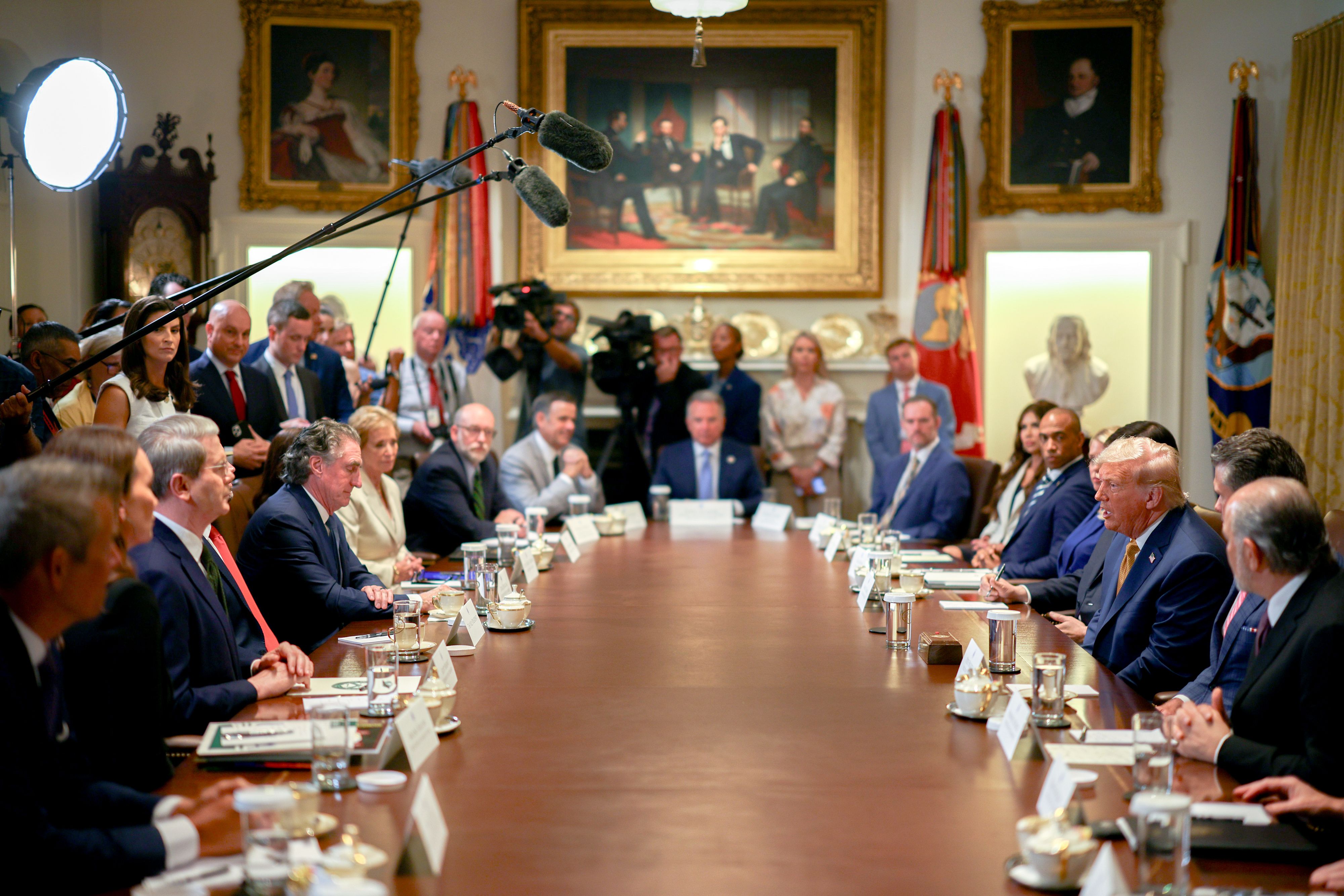 President Trump presides over a Cabinet meeting in the White House yesterday.
