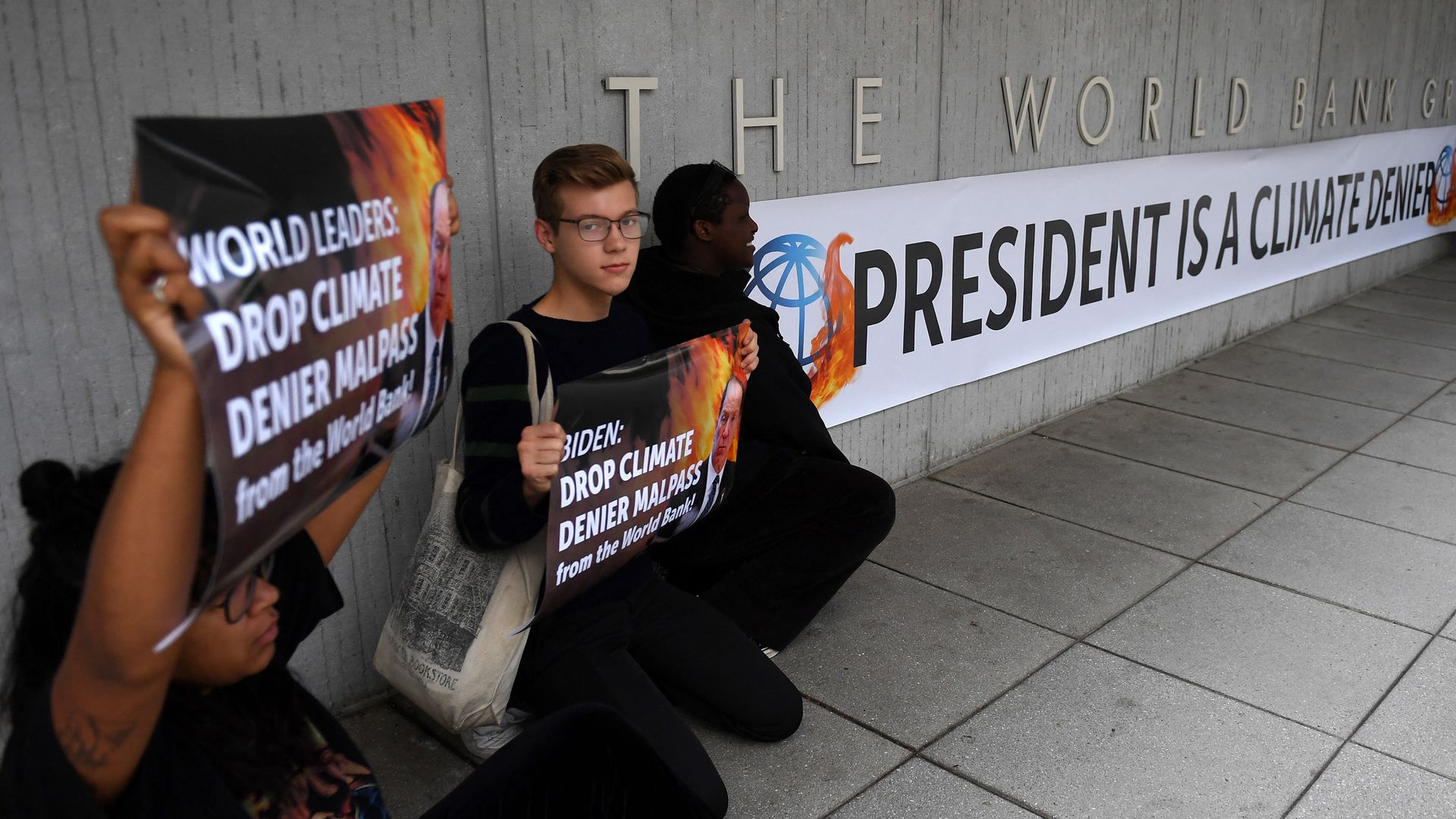 Protestors at the World Bank after the bank's president made comments skeptical of the scientific consensus on climate change.