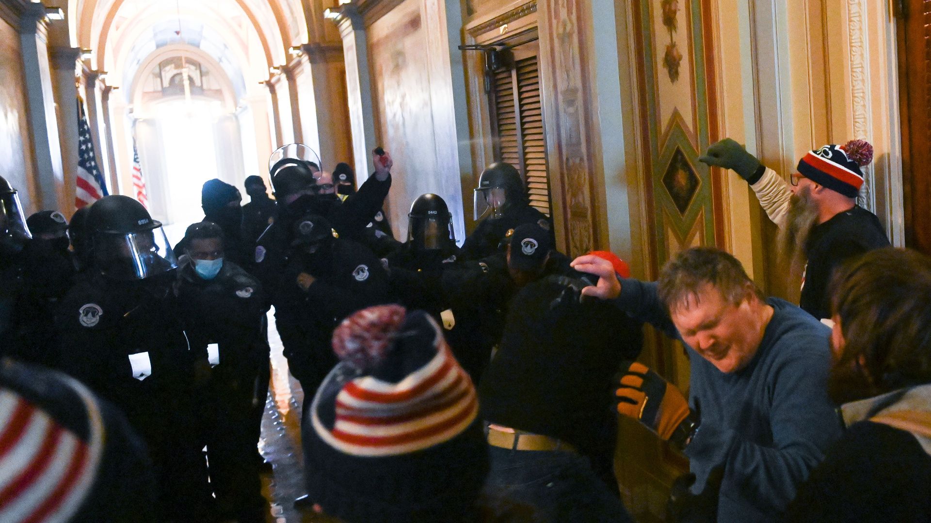 Police spray supporters of US President Donald Trump as they protest inside the US Capitol