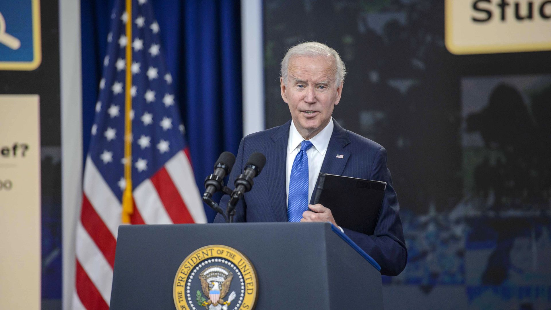 President Biden speaking at podium