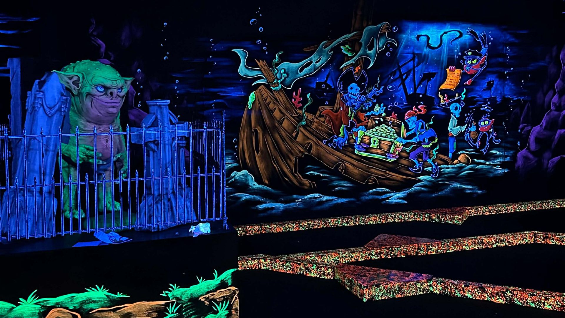 A neon and black light mini golf course 