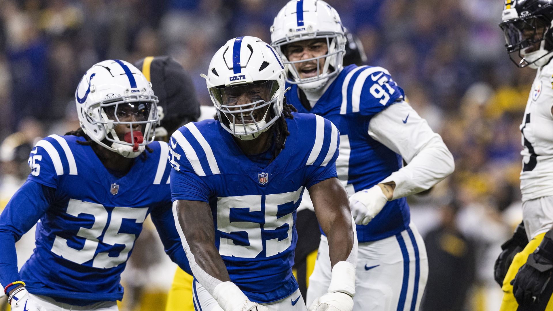 Isaiah Land #55 of the Indianapolis Colts celebrates during the first quarter of the game against the Pittsburgh Steelers at Lucas Oil Stadium on September 29, 2024 in Indianapolis, Indiana. The Colts beat the Steelers 27-24. 