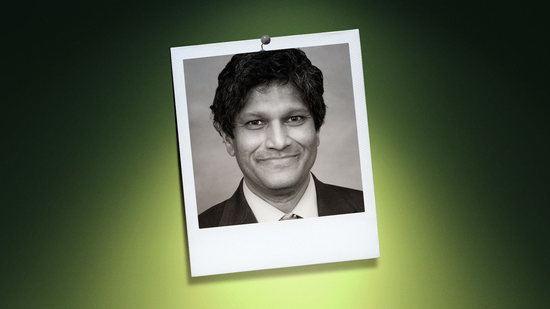 Photo illustration of Jay Chaudhuri in the center of a Polaroid photo under a green spotlight.