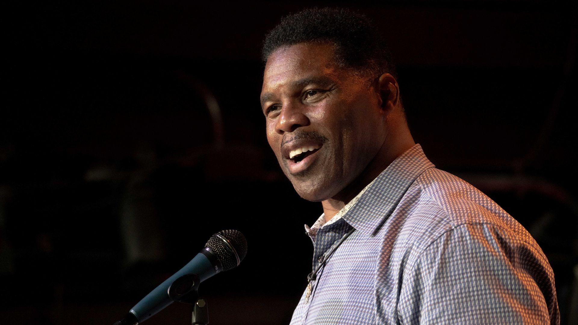 Republican candidate for US Senate Herschel Walker speaks at a rally.