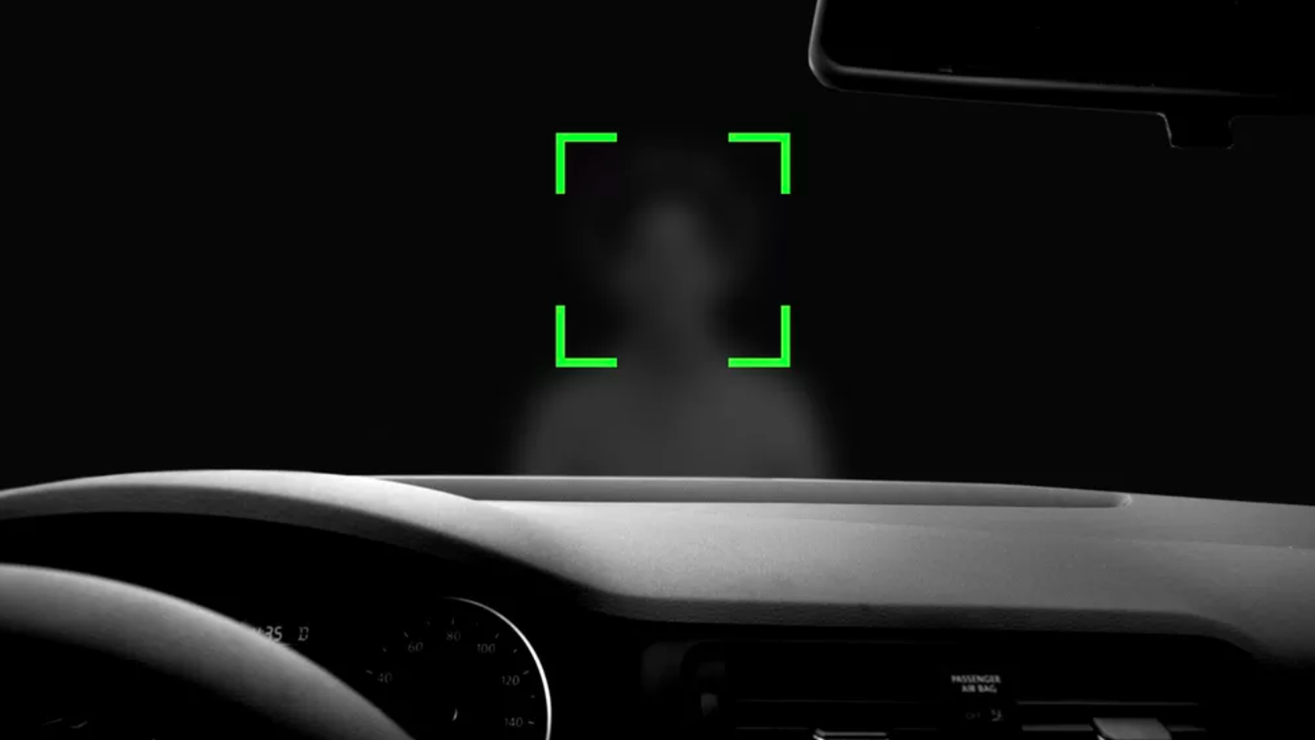 In this illustration, the viewer looks through the windshield from inside a car and sees a green square around a blurred persons face.