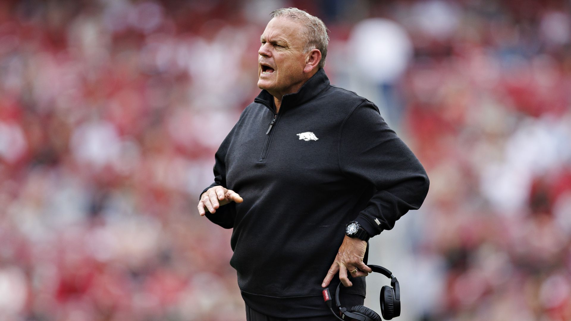 Head Coach Sam Pittman of the Arkansas Razorbacks stands on the field yelling to the officials in the second half during a game against the Ole Miss Rebels at Donald W. Reynolds Razorback Stadium on November 02, 2024 in Fayetteville, Arkansas. The Rebels defeated the Razorbacks 63-31. (Photo by Wesl