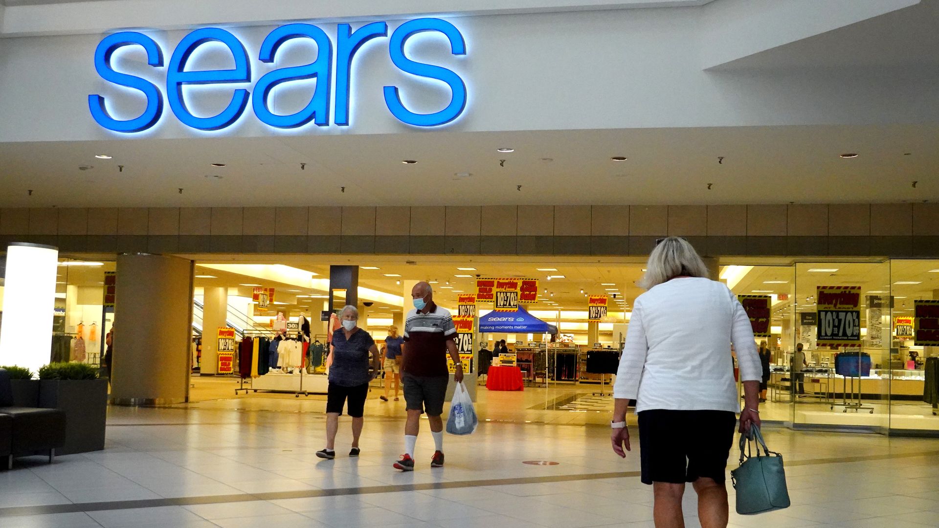 A photo of the Sears sign at Woodfield Mall. 