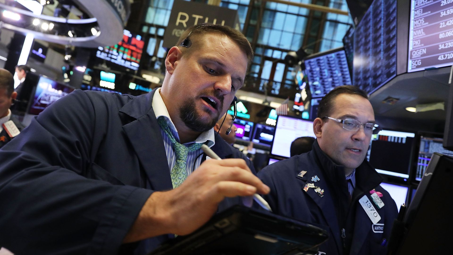 Traders work on the floor of the New York Stock Exchange (NYSE) on November 20, 2018 in New York City