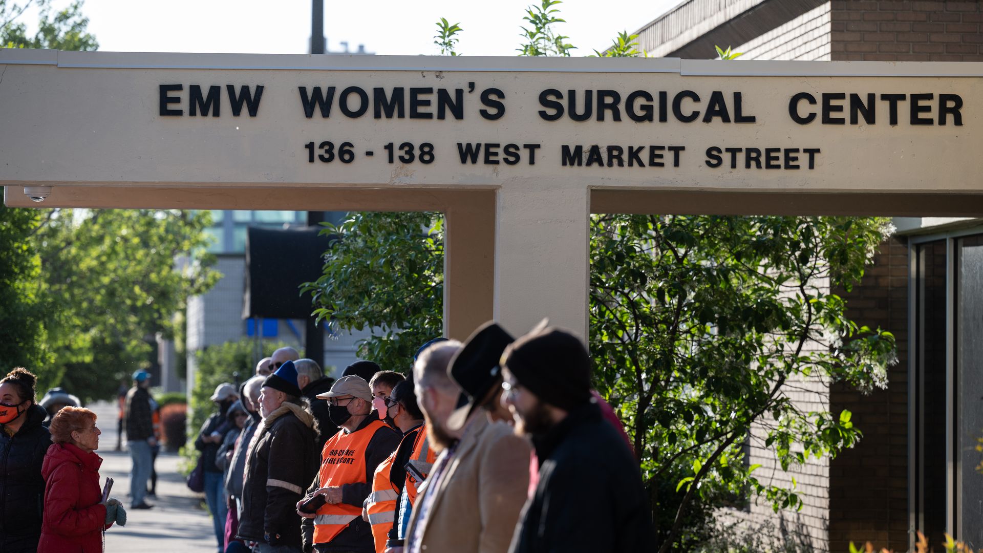 Photo of people lined up in front of an EMW Women's Surgical Center