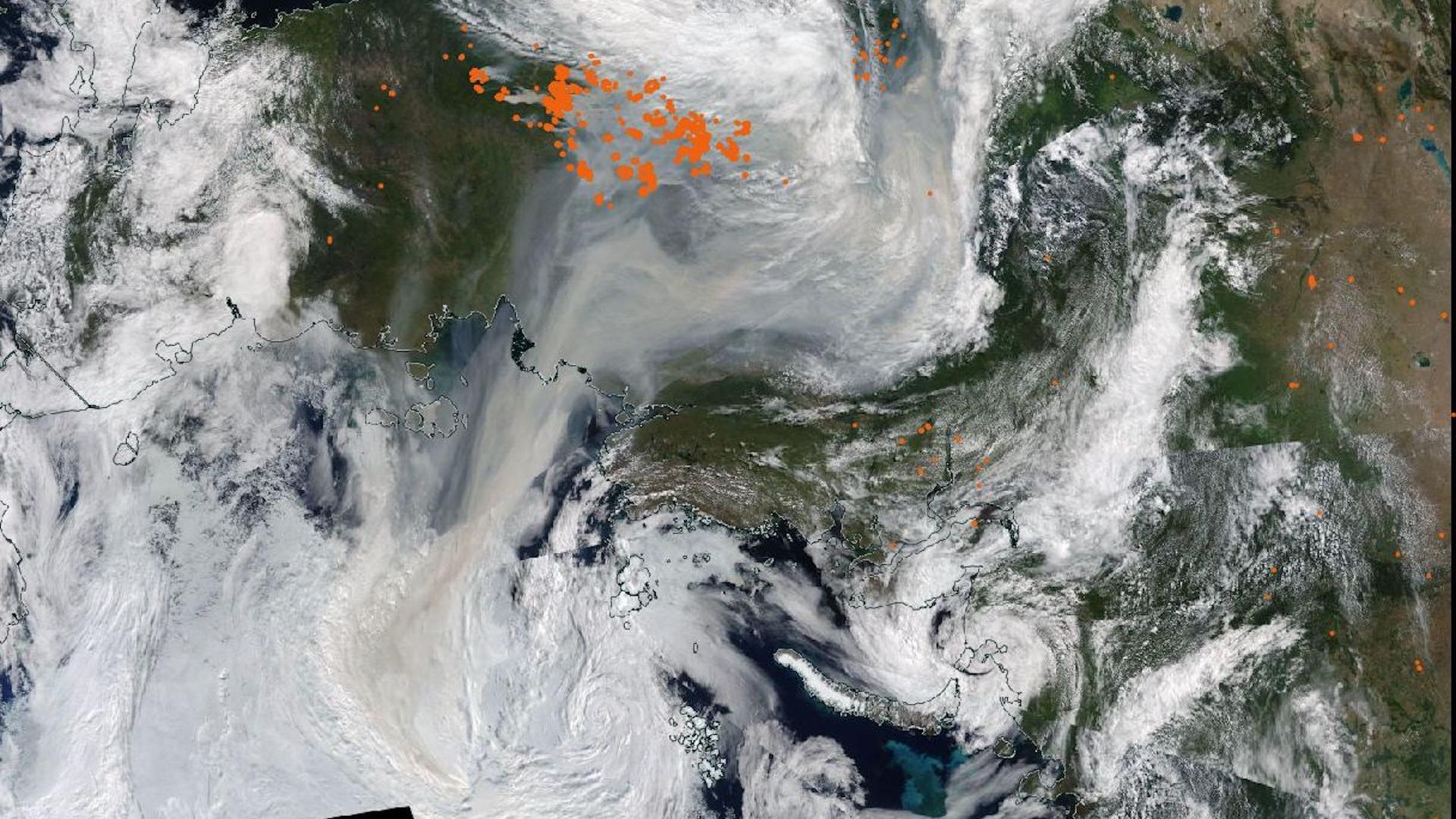 Satellite image showing clouds, dots indicating wildfires, and a plume of smoke directed toward the North Pole.