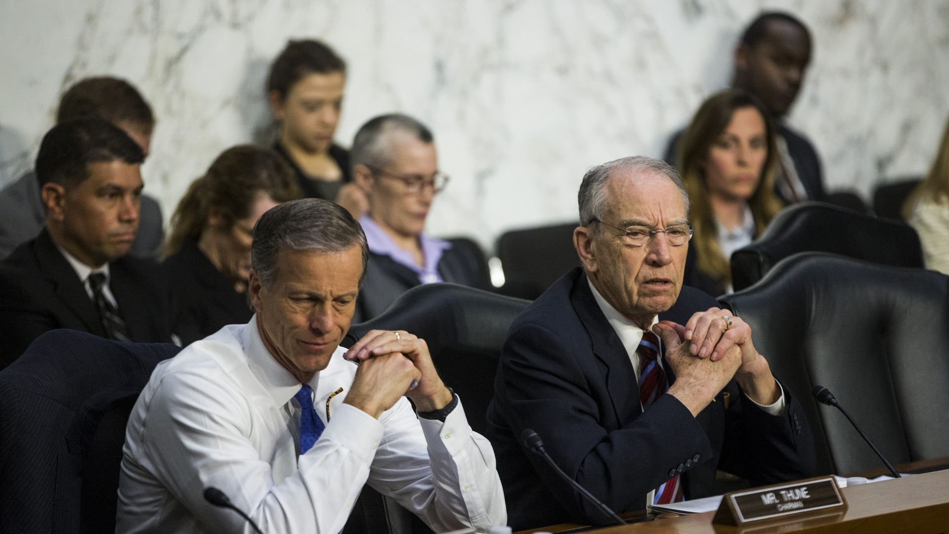 Sen. John Thune alongside Iowa Sen. Chuck Grassley at a Capitol Hill hearing on April 10, 2018. 