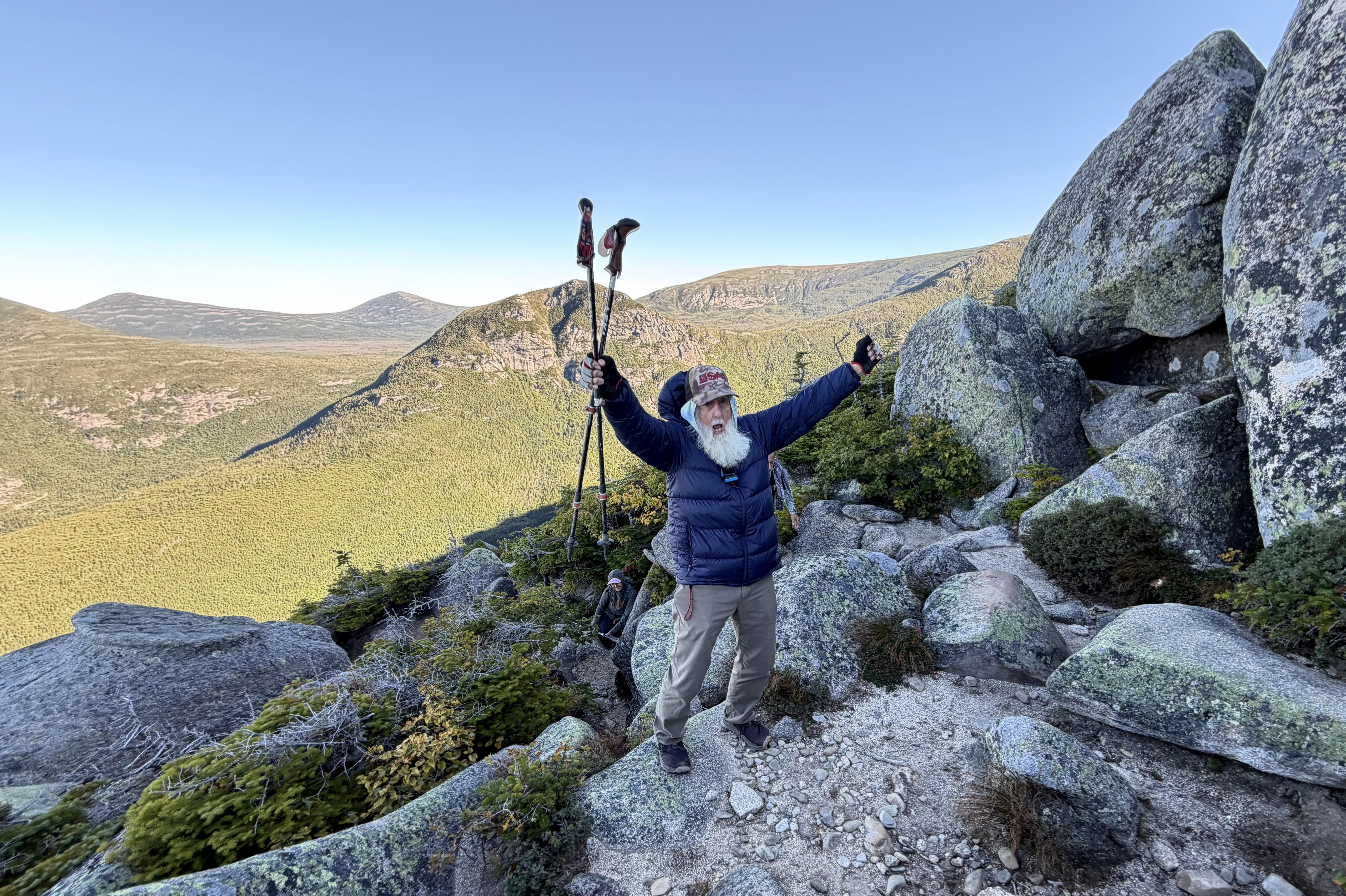 Dale Sanders, 91, celebrates after completing a difficult section of Mount Katahdin in Maine yesterday.