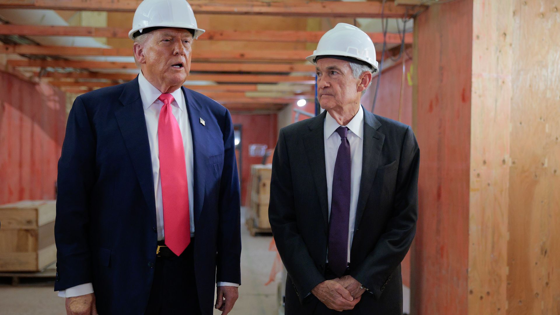 Trump delivers remarks alongside then-Federal Reserve Chair Jerome Powell as they tour the central bank's headquarters renovation last year.