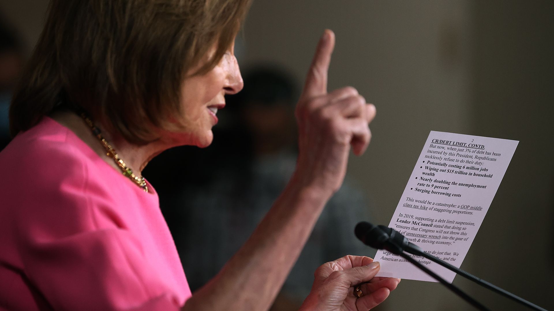 House Speaker Nancy Pelosi is seen reading back a quote from Senate Minority Leader Mitch McConnell during a news conference.