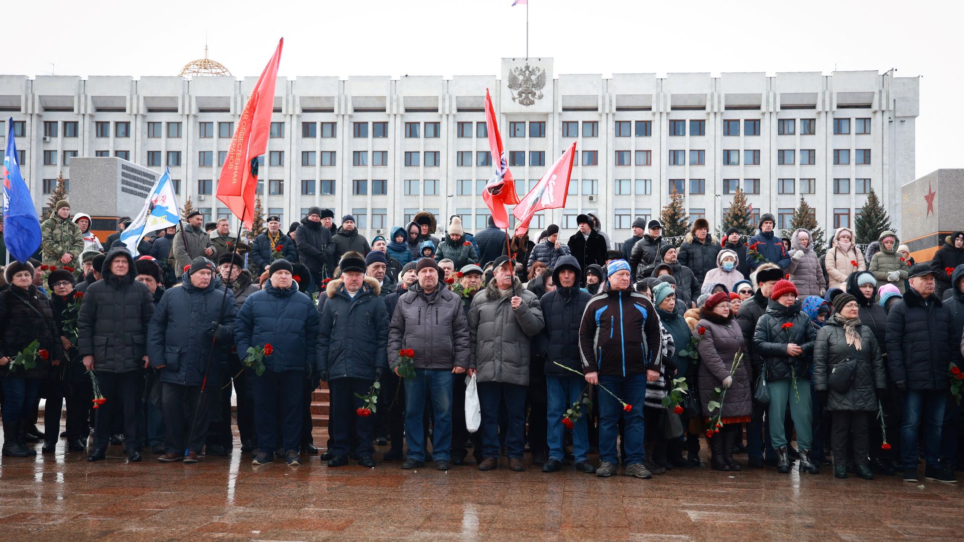 Mourners gather to lay flowers in memory of more than 60 Russian soldiers that Russia says were killed in a Ukrainian strike on Russian-controlled territory, in Samara, on January 3, 2023. 