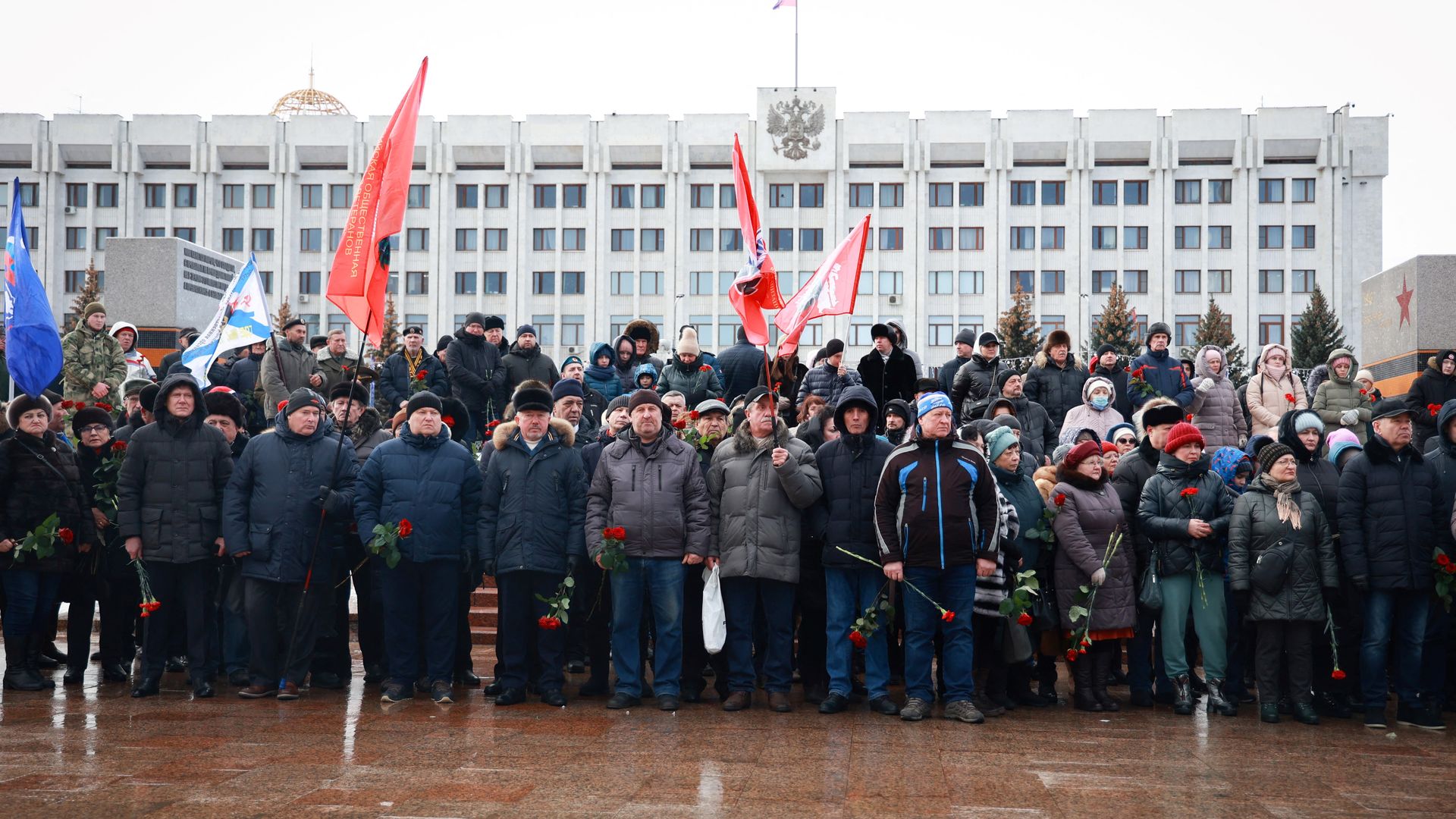Mourners gather to lay flowers in memory of more than 60 Russian soldiers that Russia says were killed in a Ukrainian strike on Russian-controlled territory, in Samara, on January 3, 2023.