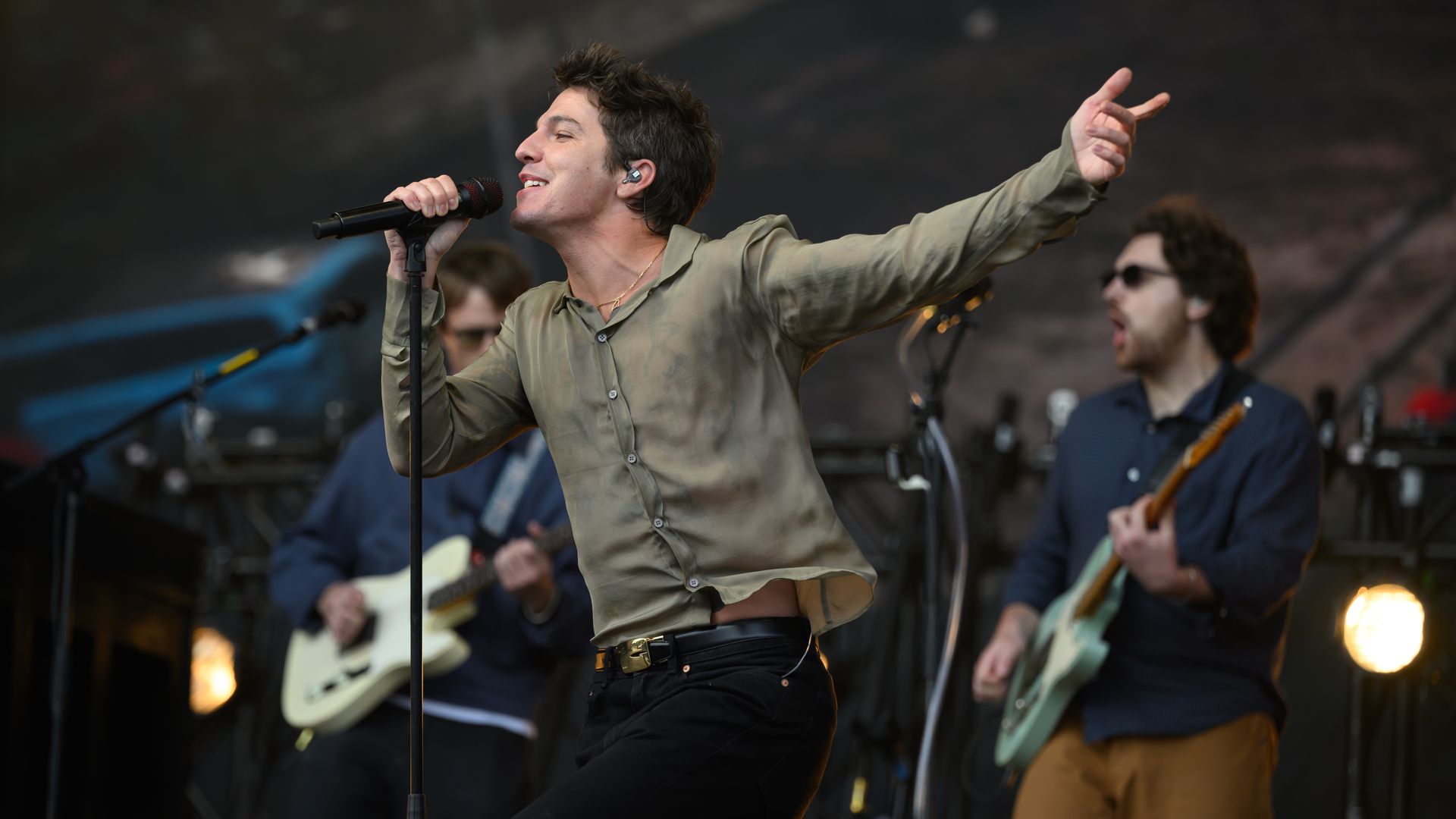 The singer Role Model performs on stage.