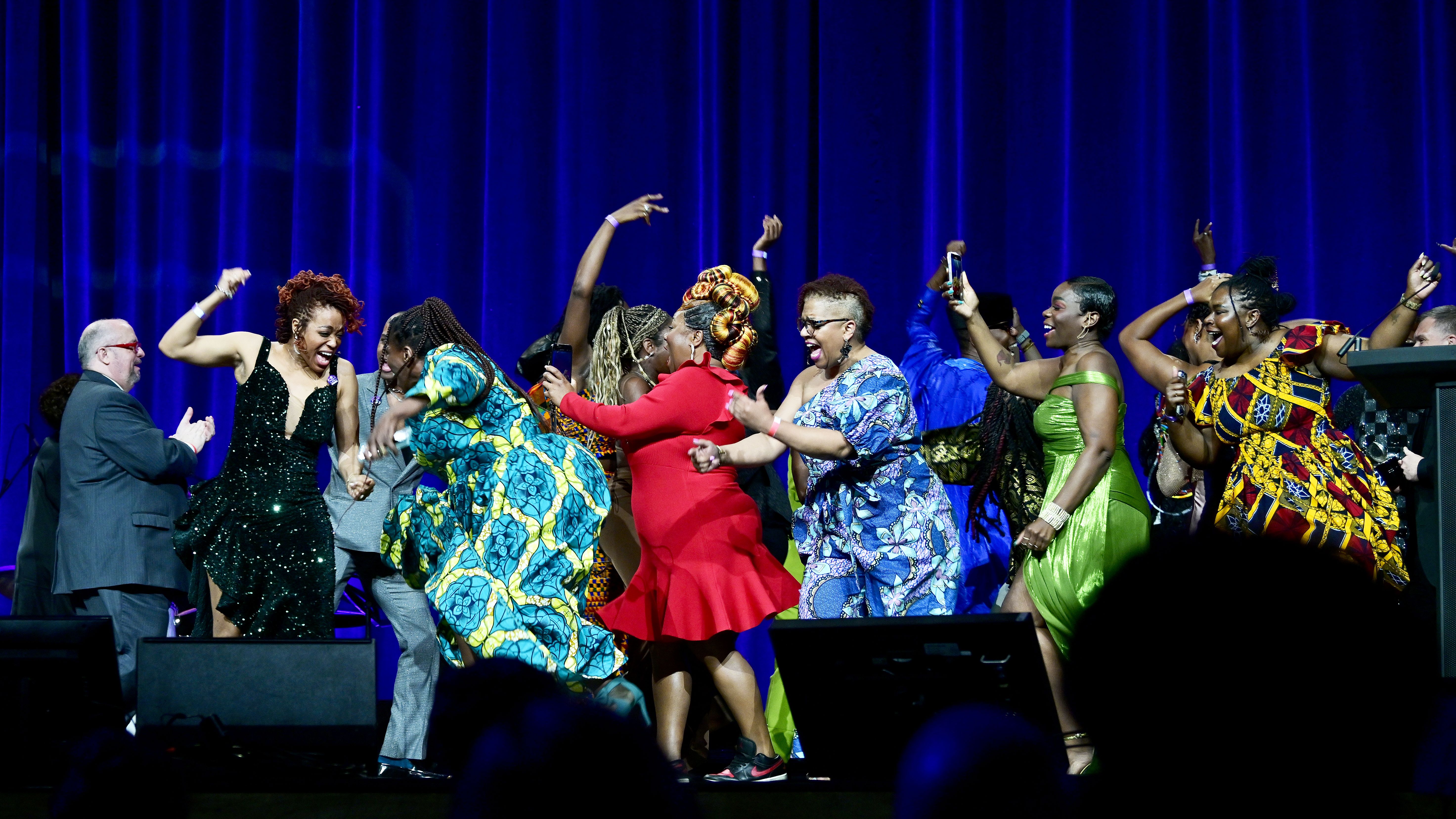 The photo is from the Helen Hayes Awards 2024. The cast of Fela! winning Outstanding Production (Musical, Hayes). Co-production from The Olney Theatre and Round House Theatre. Credit: Shannon Finney