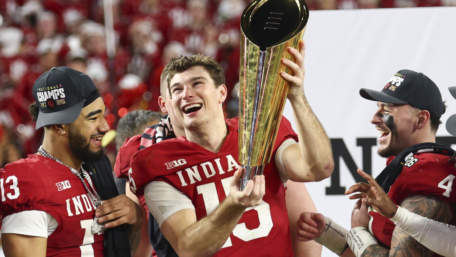 Fernando Mendoza #15 of the Indiana Hoosiers raises the National Championship Trophy after Indiana defeated the Miami Hurricanes 27-21 in the 2026 College Football Playoff National Championship at Hard Rock Stadium on January 19, 2026 in Miami Gardens, Florida. 