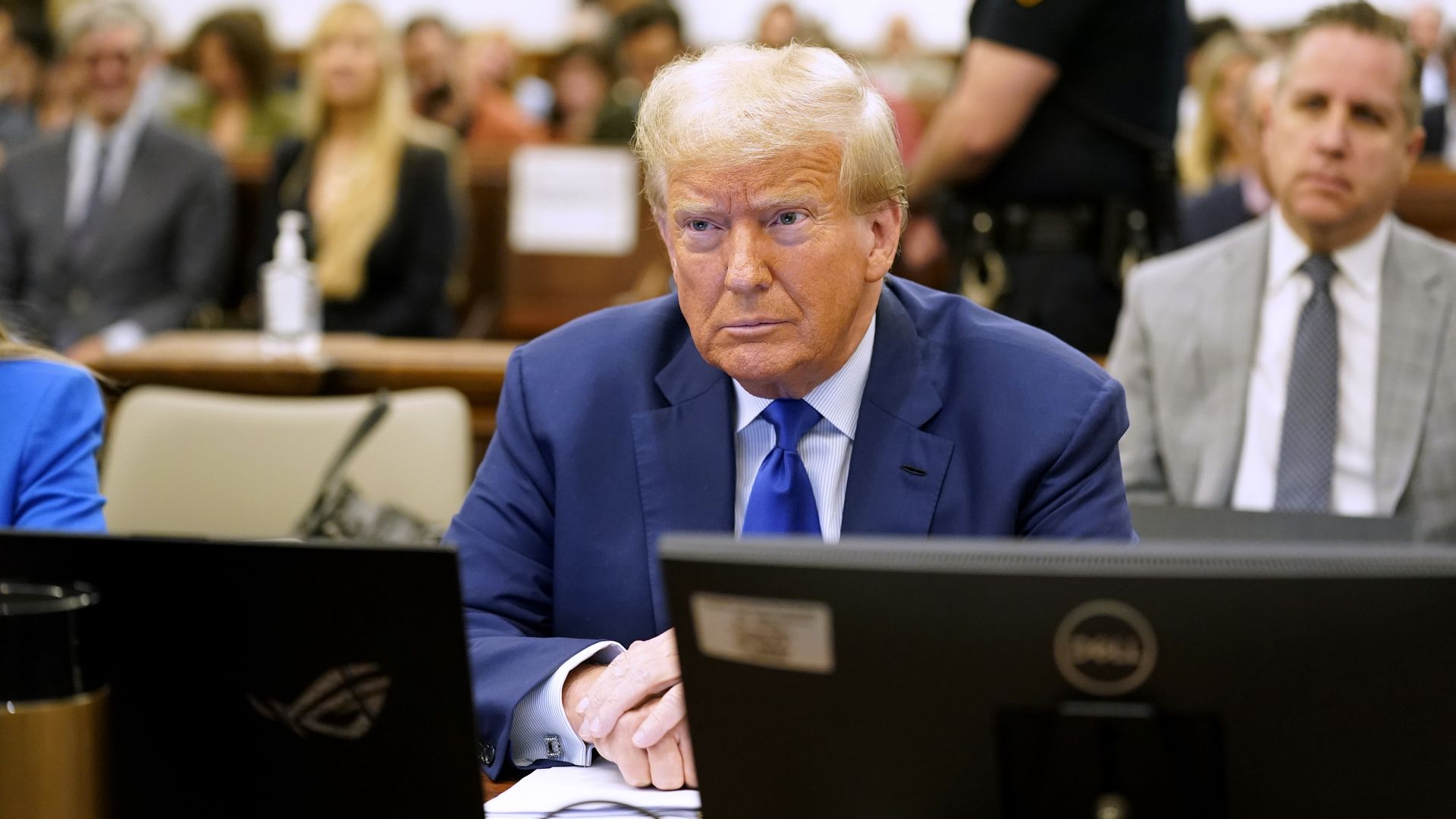 Former President Donald Trump sits in court during his civil fraud trial at New York State Supreme Court on October 25, 2023 in New York City.