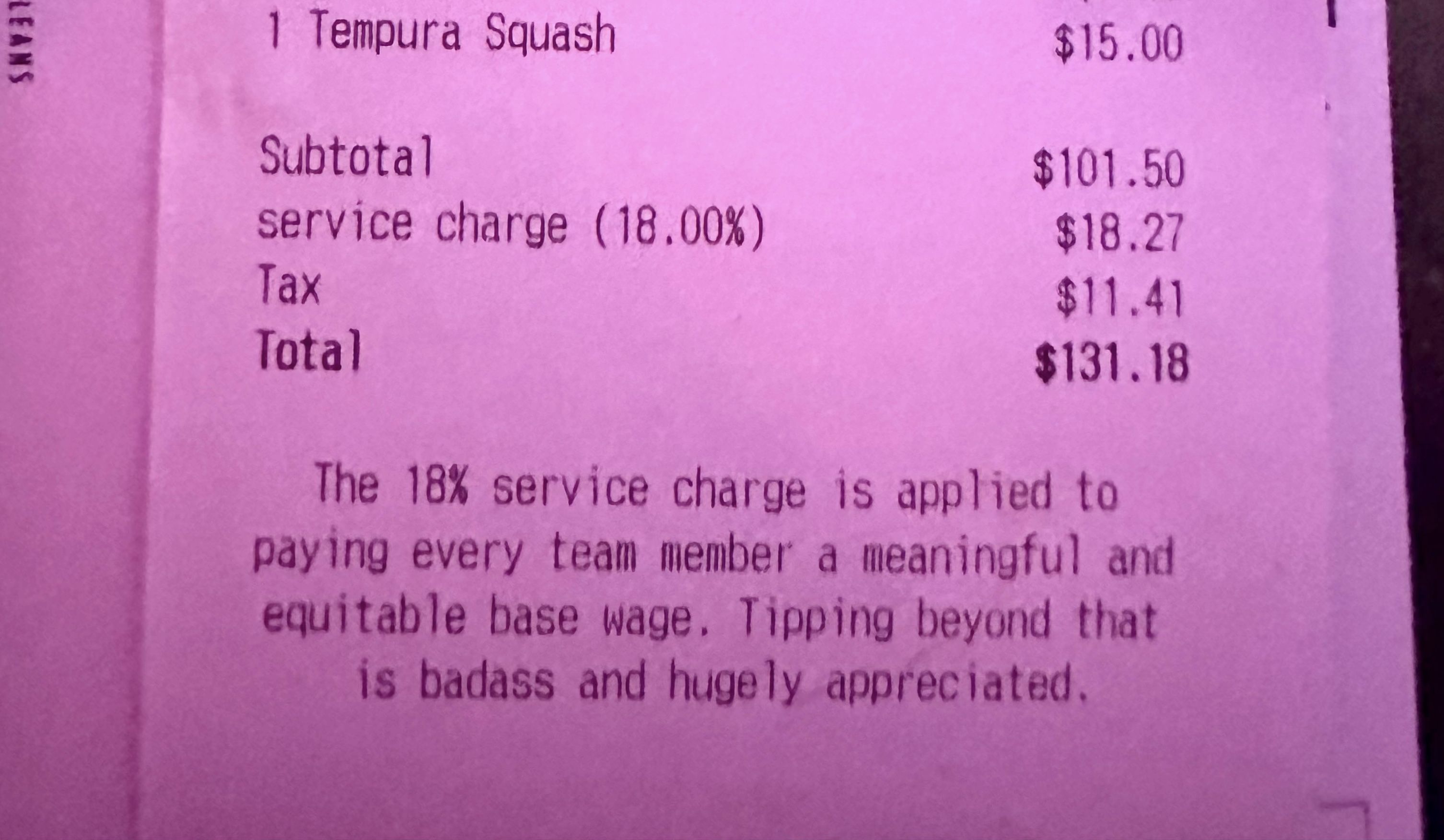 Photo shows a guest check at Hungry Eyes with the 18% service charge.