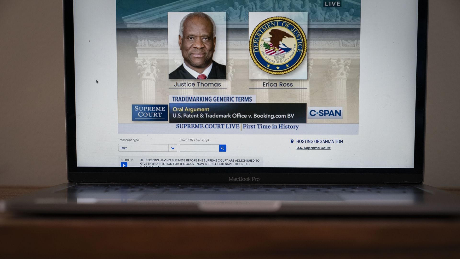 A photo of a computer displaying an audio stream of Clarence Thomas speaking during a Supreme Court teleconference