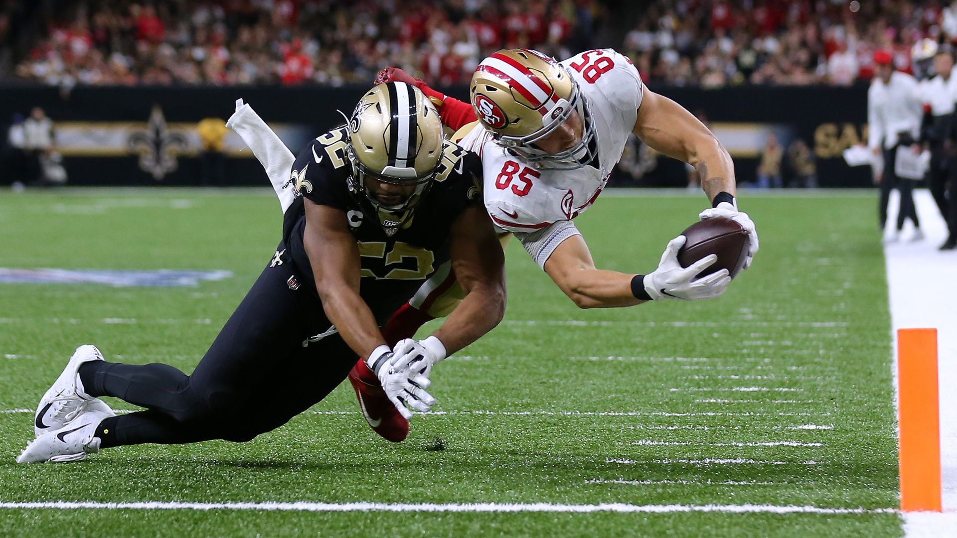 George Kittle diving for the pylon