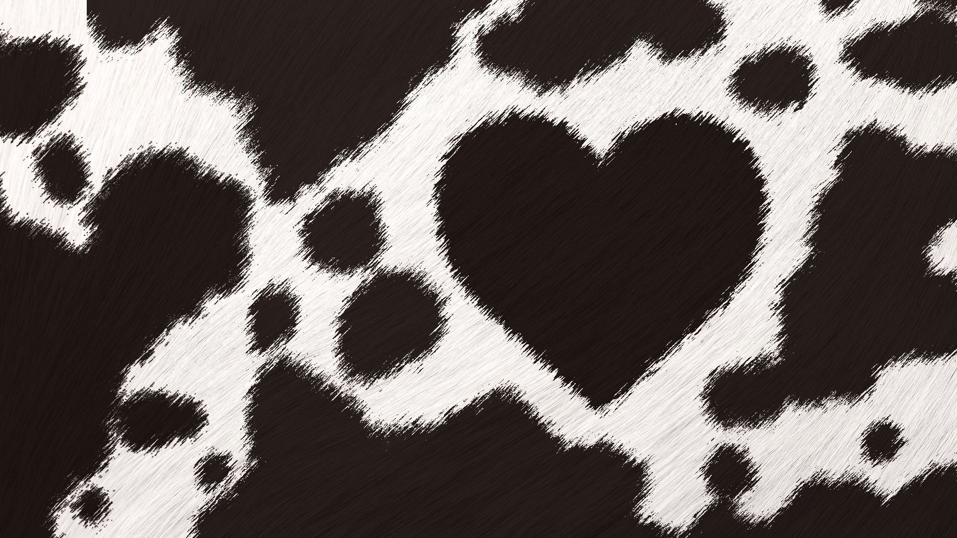 Illustration of cow print with a heart shaped spot.