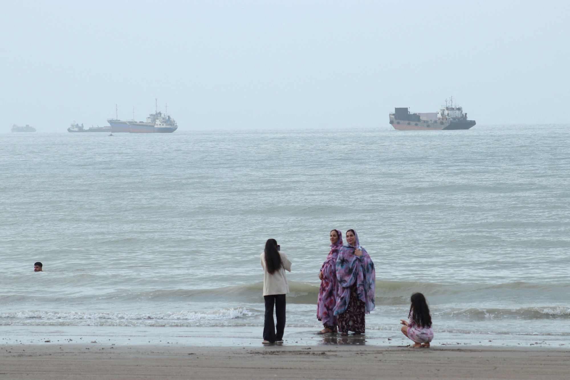 Vessels in the Strait of Hormuz yesterday near a beach in Bandar Abbas, Iran.