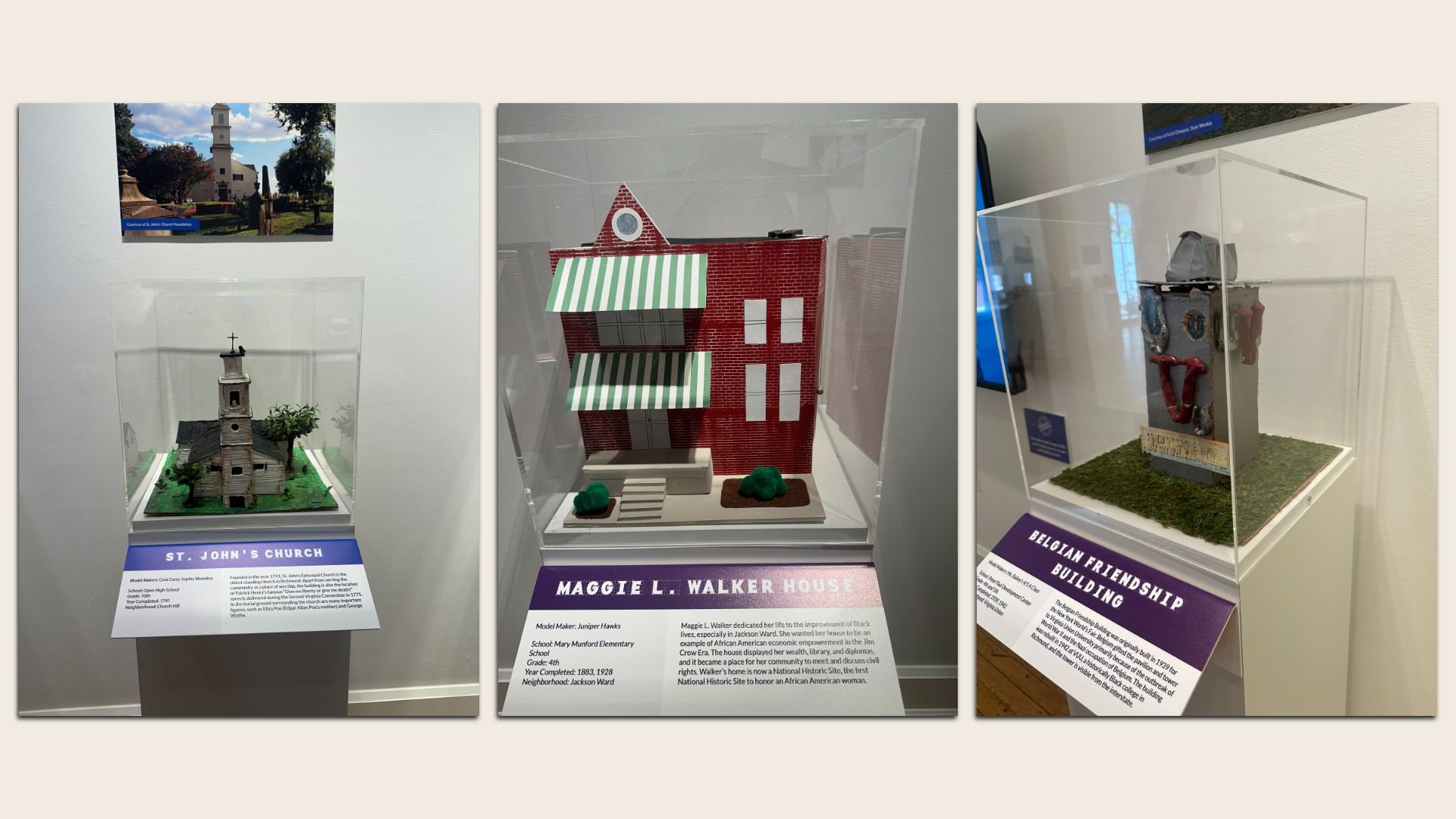 Three museum dioramas in glass cases: left a white church steeple; middle a red brick building with green-striped awnings; right a display with a helmet and armor on a grassy base.