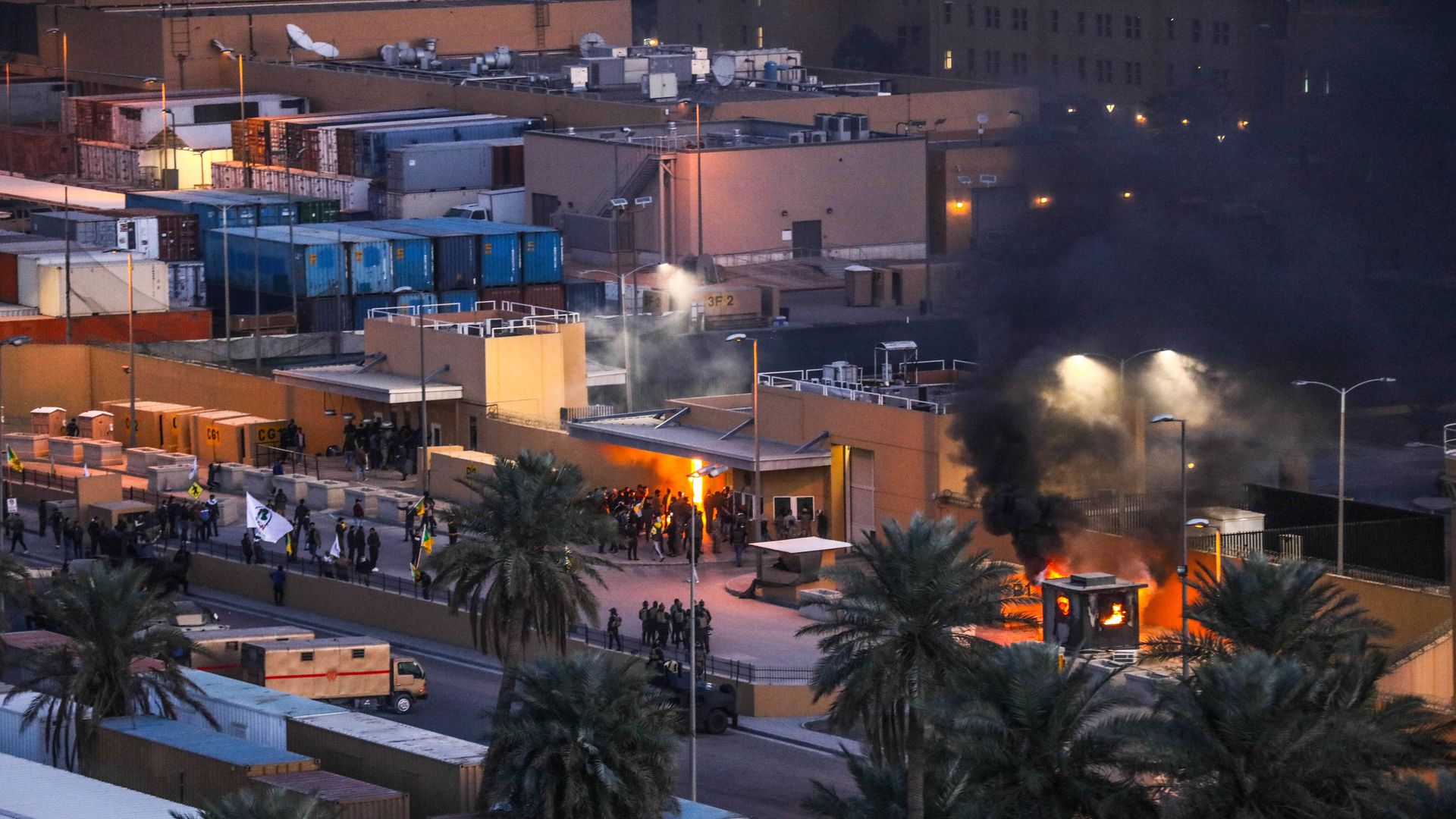 The  US embassy in Iraq on December 31 smoke billowing from an entrance of the embassy in the capital Baghdad