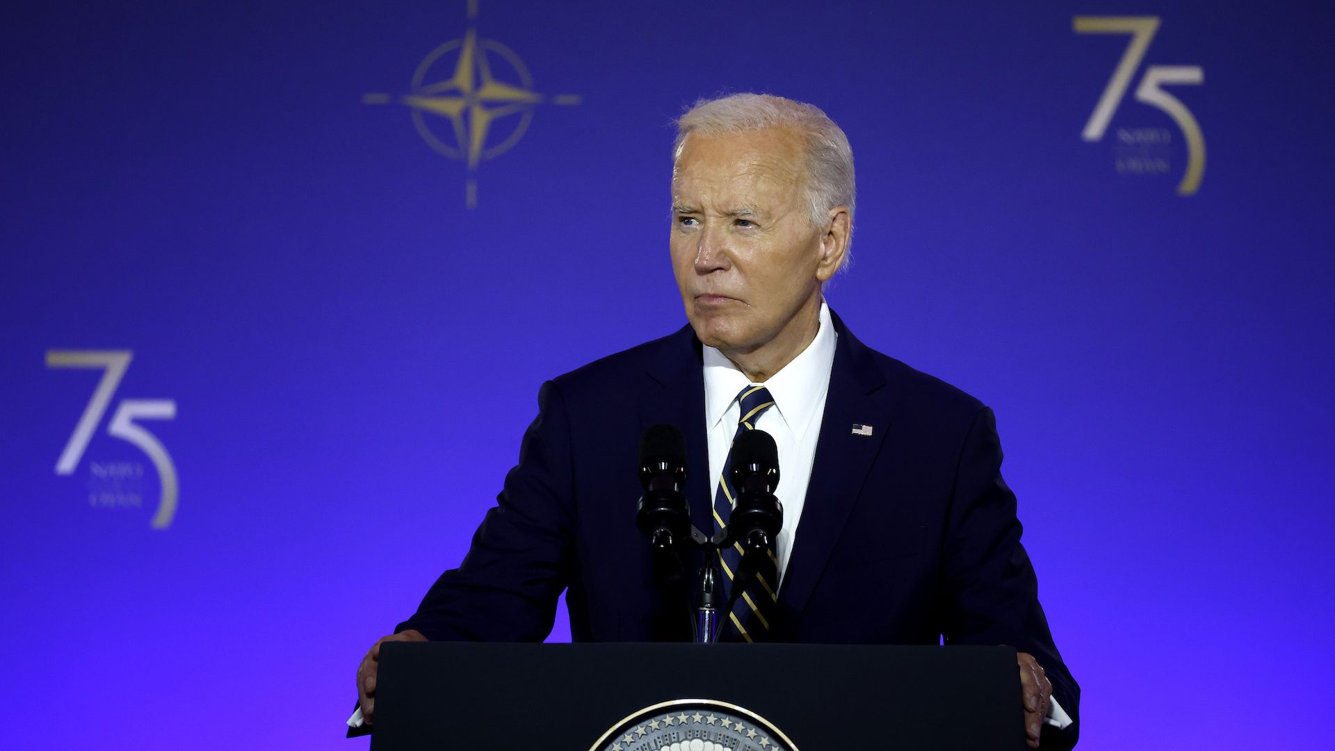 President Joe Biden at a podium.
