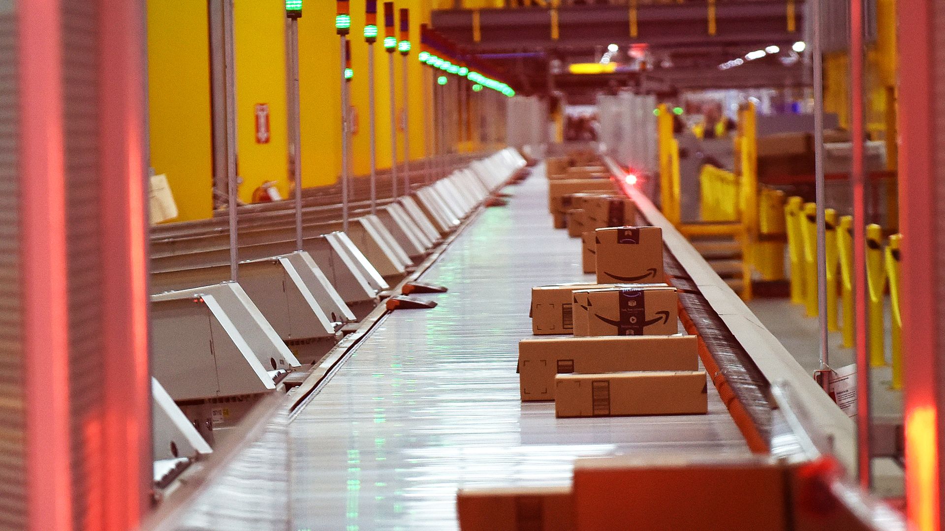 Boxes move down a conveyor belt