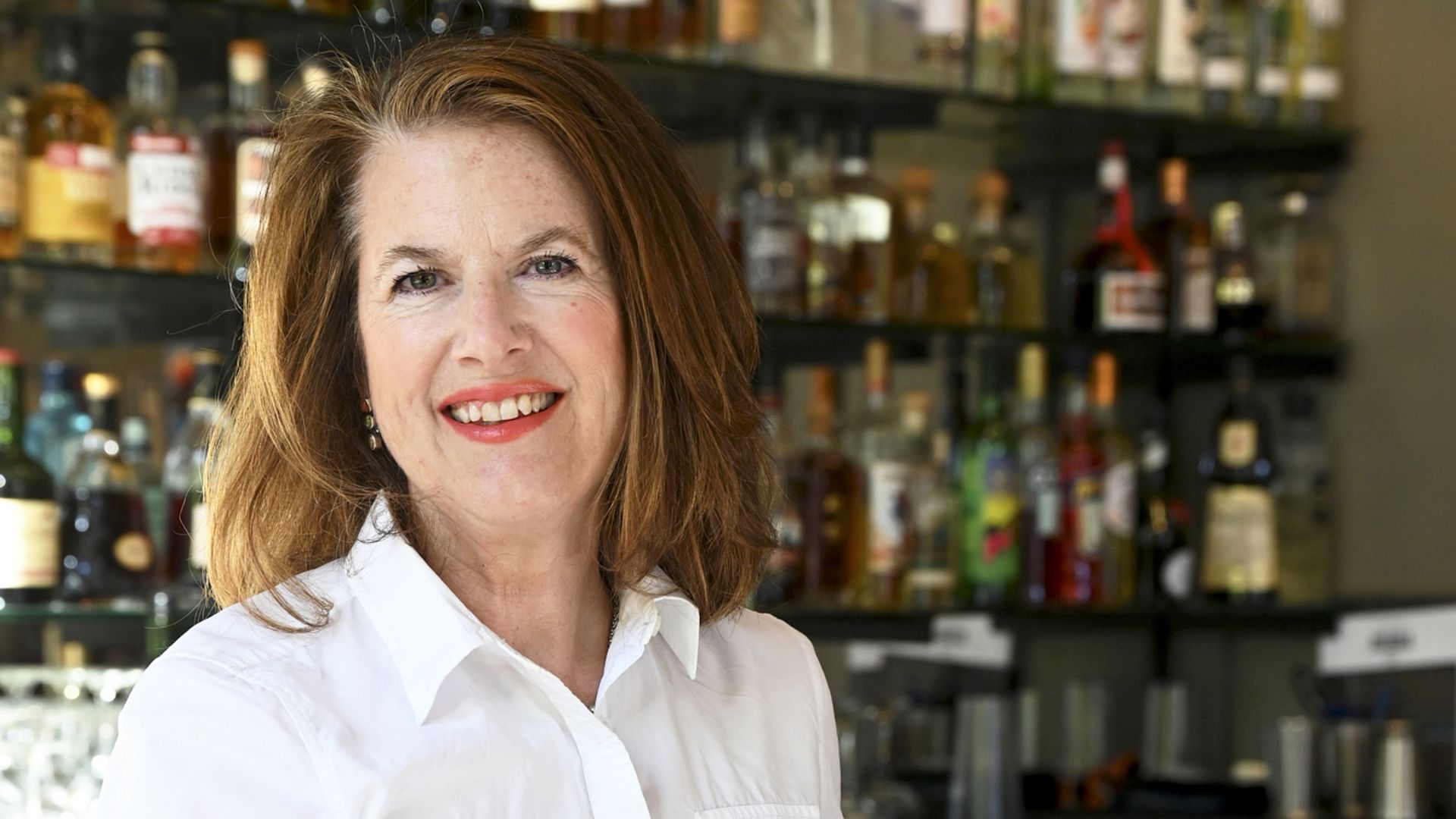 Wini Moranville sitting at a bar