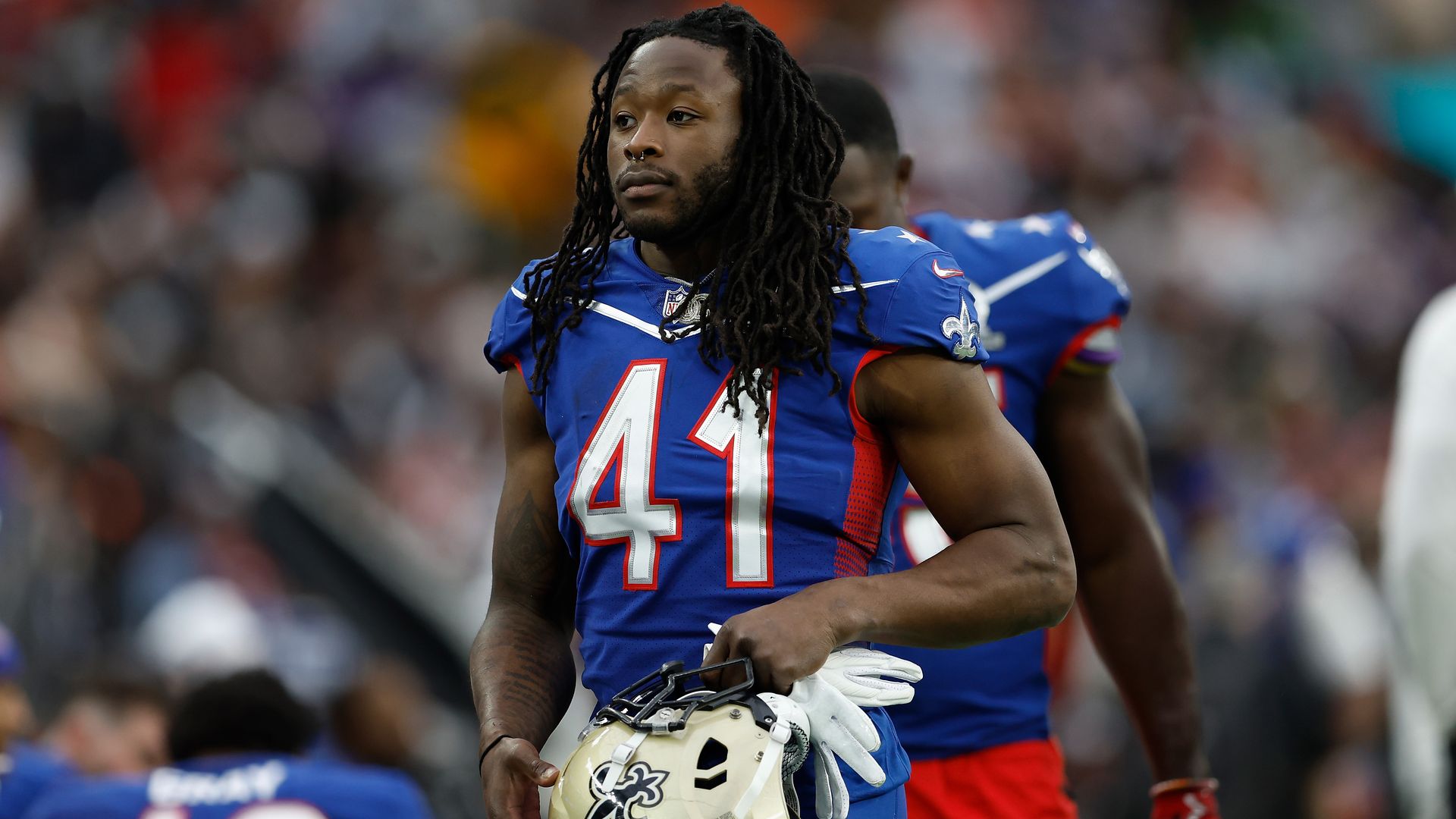Alvin Kamara walks on the sidelines during the 2022 Pro Bowl in Las Vegas on Sunday.