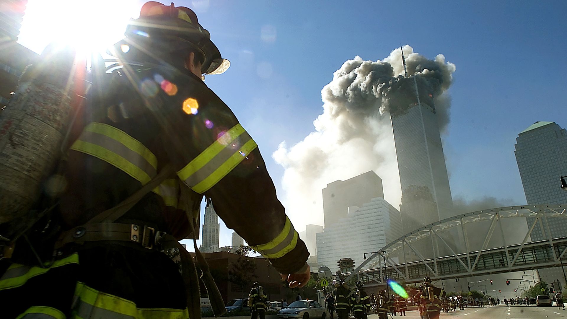 Firefighters walking toward one of the towers of World Trade Center in New York City on Sept. 11, 2001. Photo: Jose Jimenez/Primera Hora/