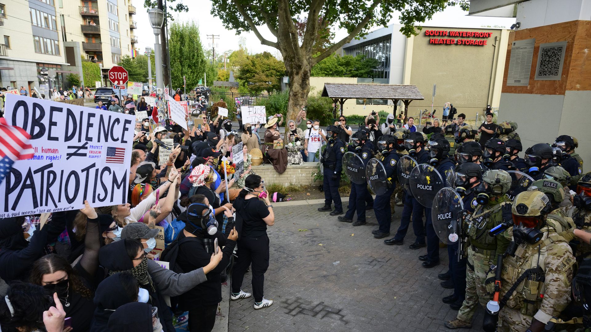 Federal agents confront protesters outside of the U.S. Immigration and Customs Enforcement building on Sept. 28, 2025 in Portland, Oregon.