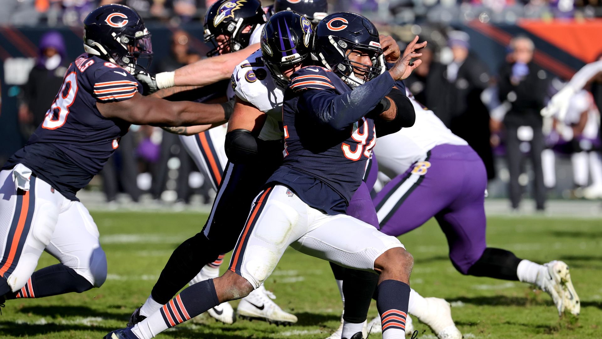A photo of a football player running.