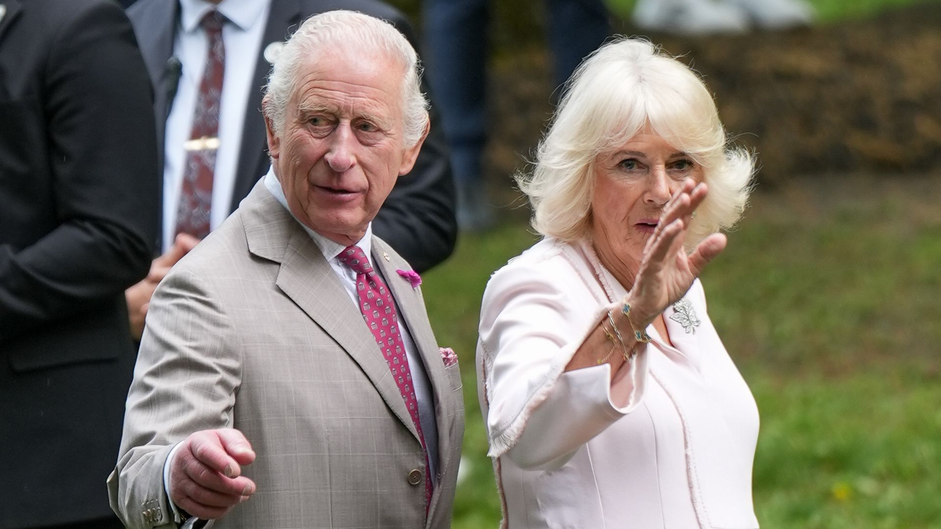 King Charles walks next to Queen Camilla 