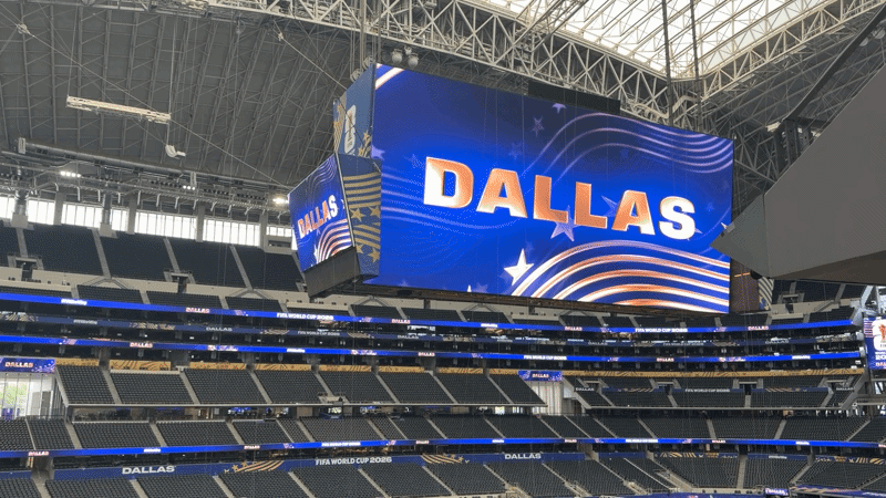 A jumbotron saying DALLAS