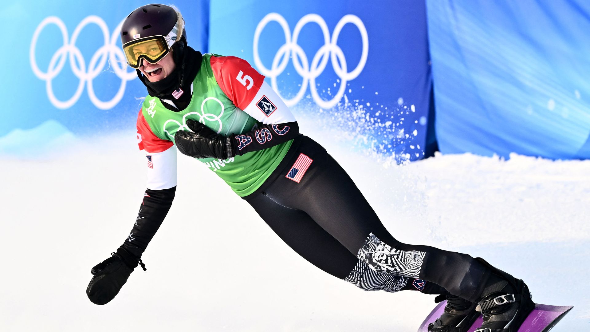 USA's Lindsey Jacobellis celebrates her win in the snowboard women's cross final during the Beijing 2022 Winter Olympic Games at the Genting Snow Park P & X Stadium in Zhangjiakou on February 9