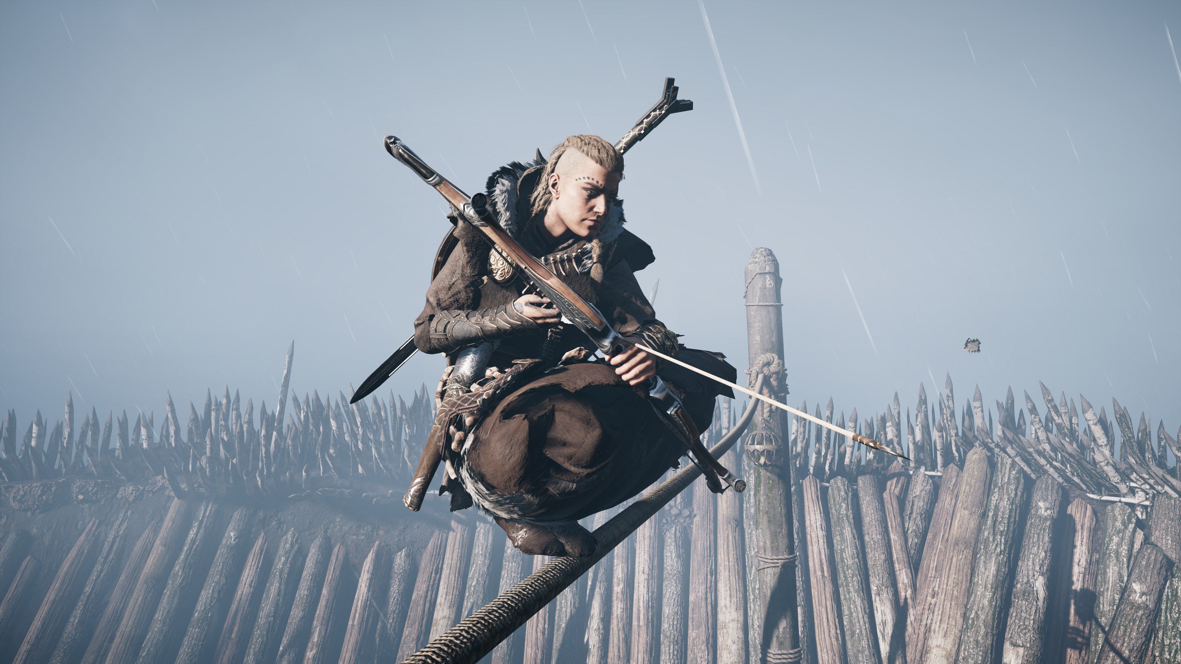 Screenshot of a viking warrior sitting on a tree branch